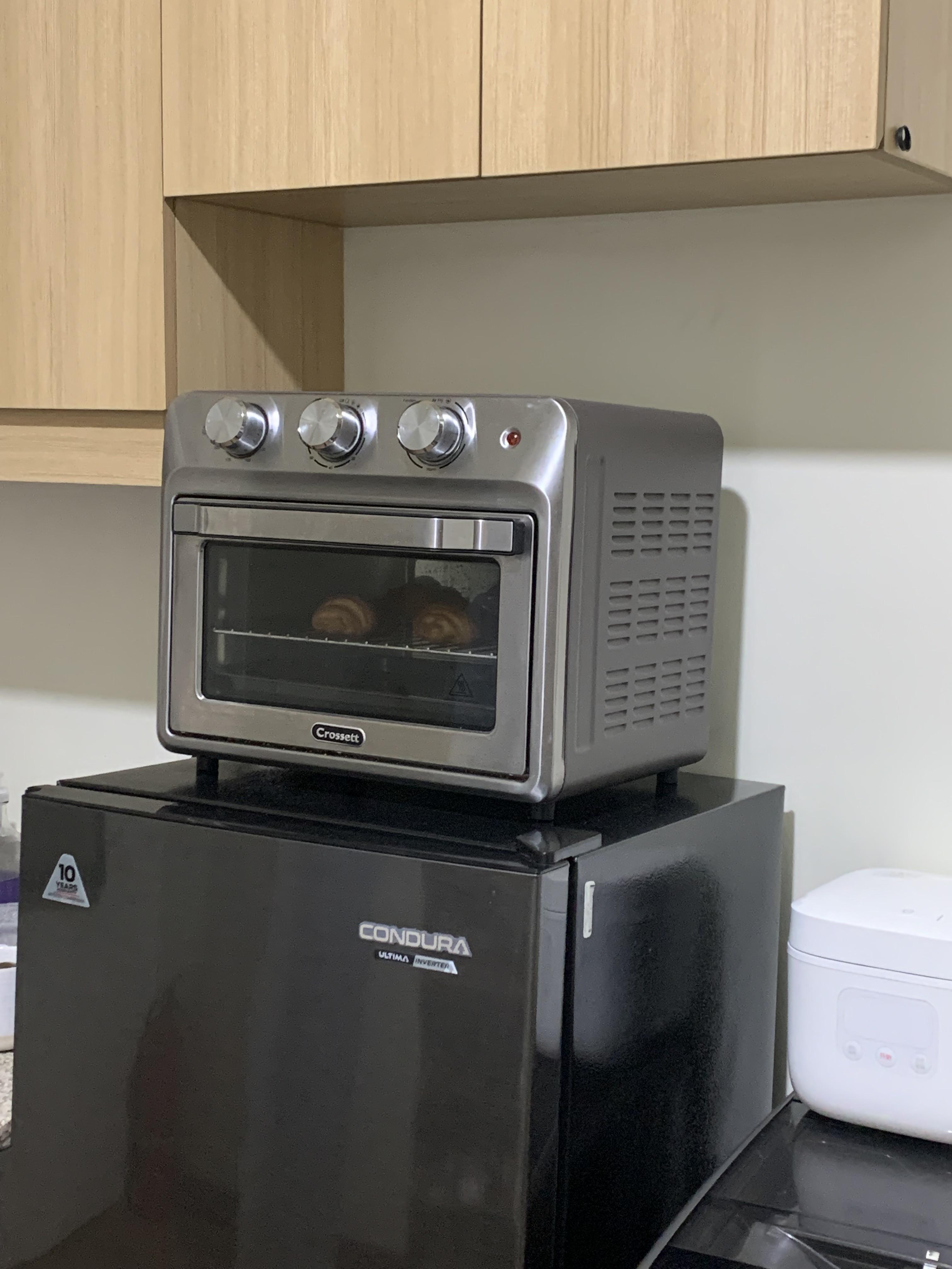 what can I put between the oven and fridge? I think the heat is making