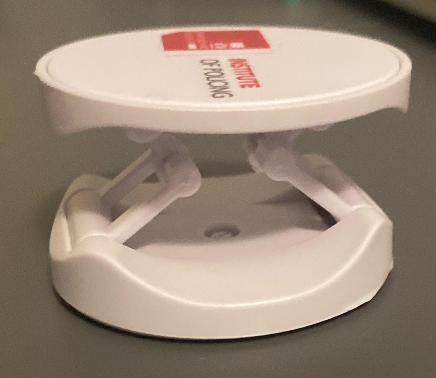 What is this white plastic thing that folds? r/whatisthisthing