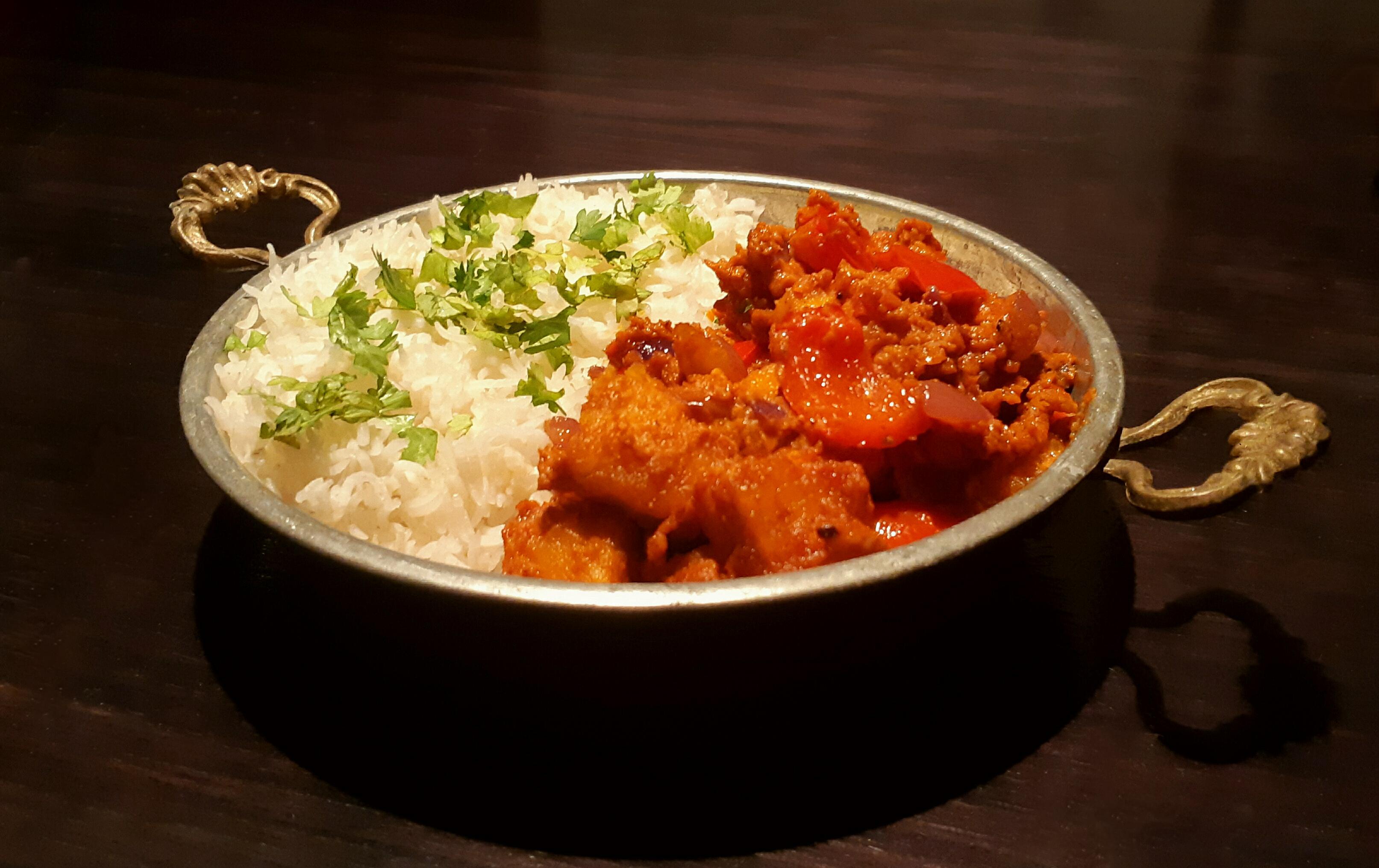 Kadai Paneer. Just substitute tofu for the paneer, and it vegan