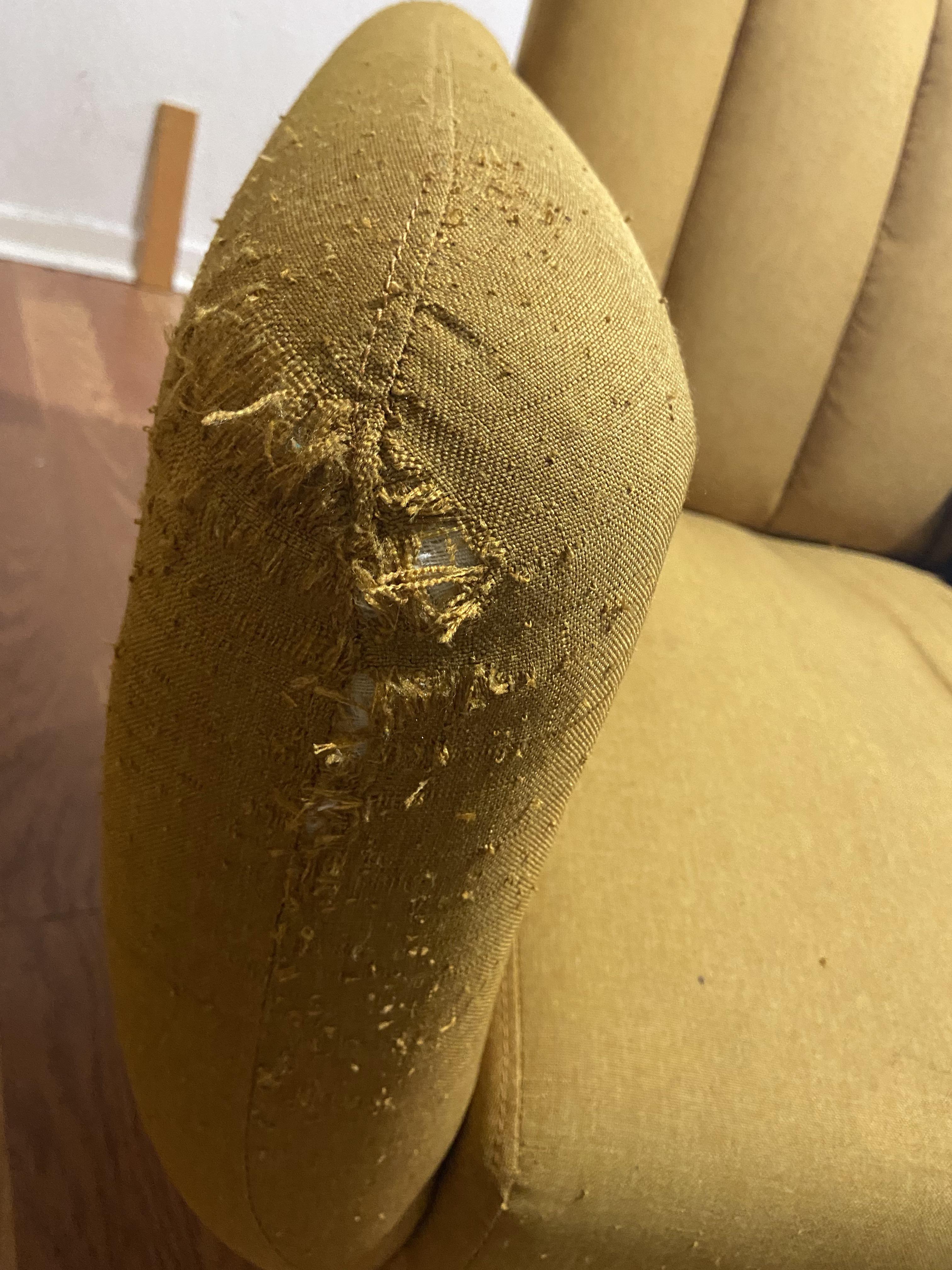 Any advice on how to fix this armrest on this couch? Do I just buy