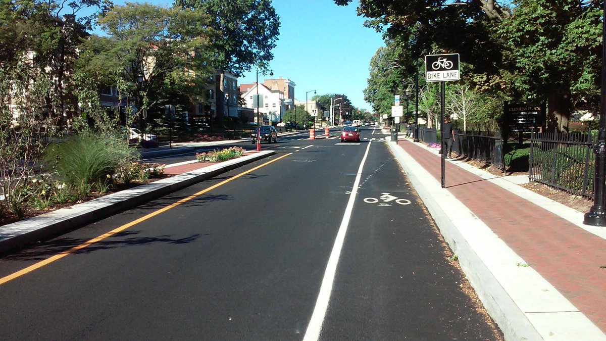 New bike lanes, concrete islands (w plants) on Farmington Ave in