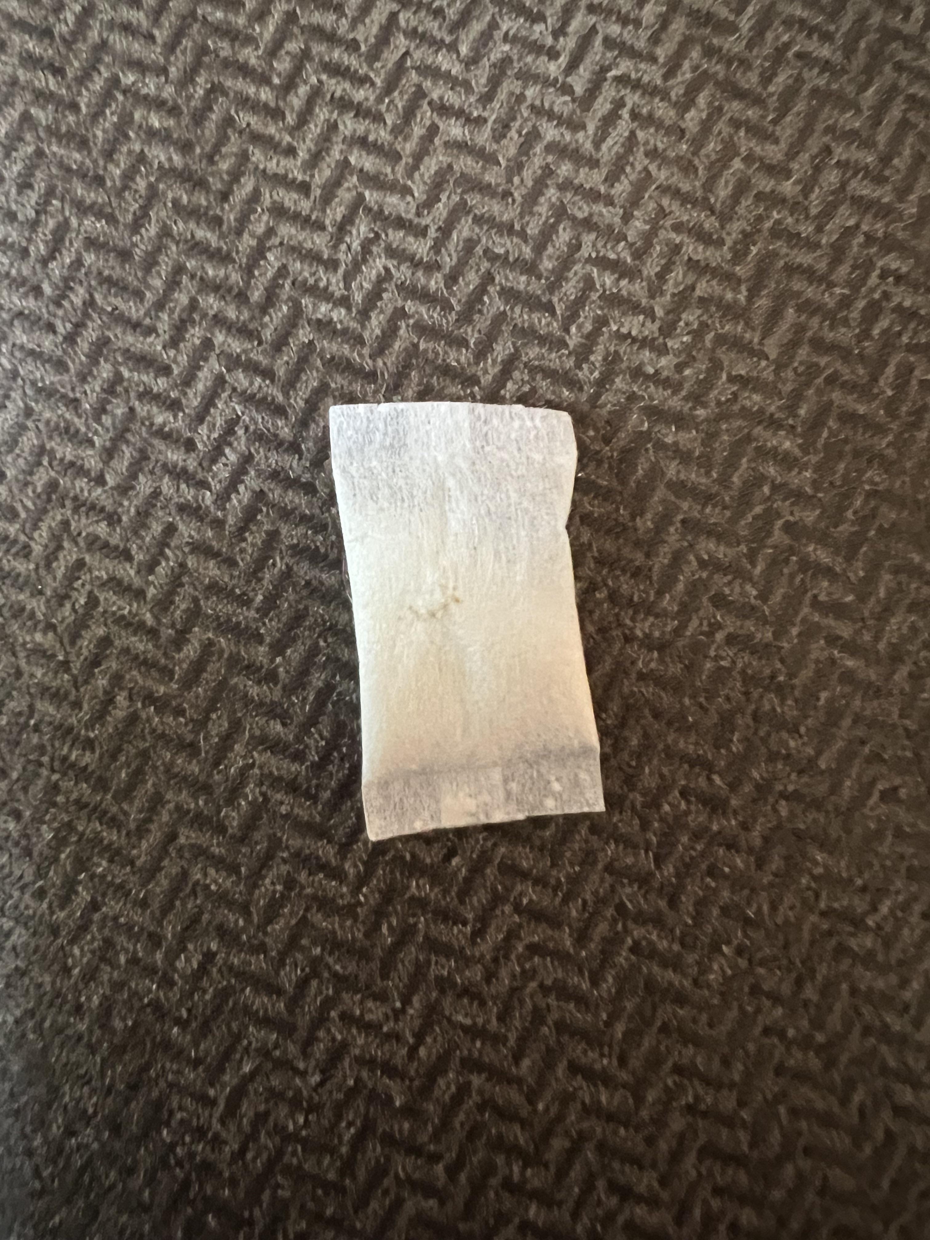 Saw a little brown spot on my on! today, what is this, is this still safe to use? r/NicotinePouch