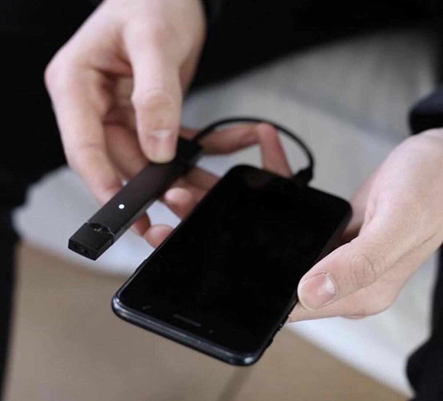 JUUL charger that uses your iPhone ofcoursethatsathing