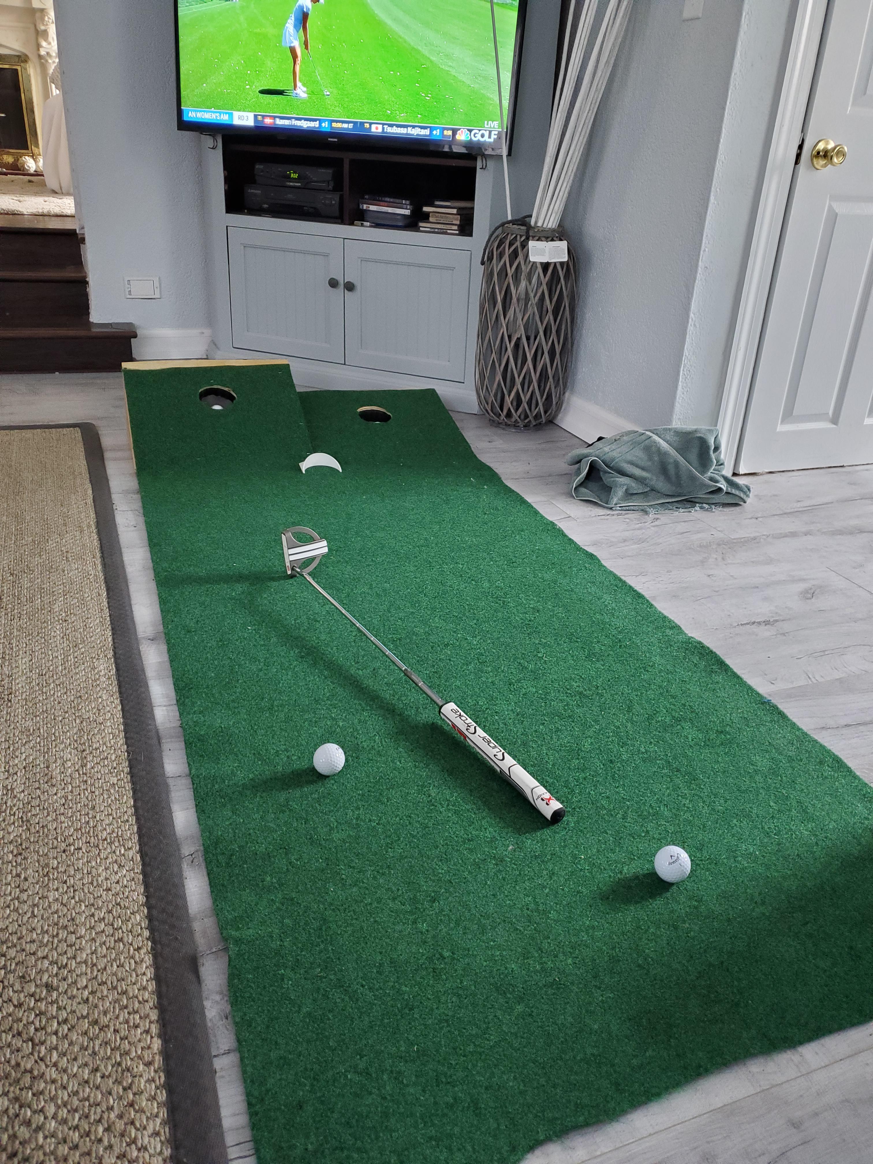 Homemade putting green and golf on the day off. Doesn't get much better. r/golf