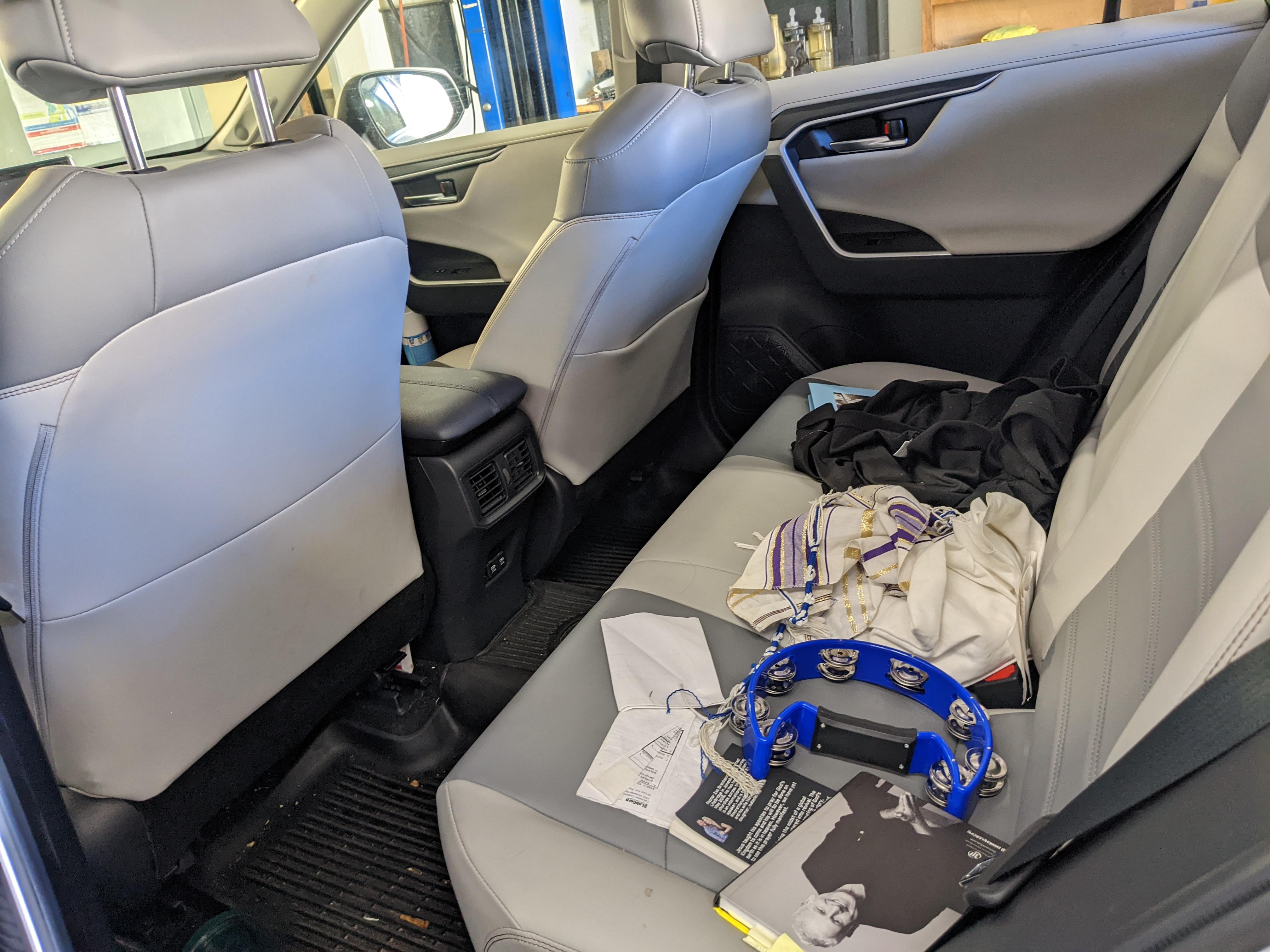 I hear a rattle from my backseat when I hit bumps. Any idea what it