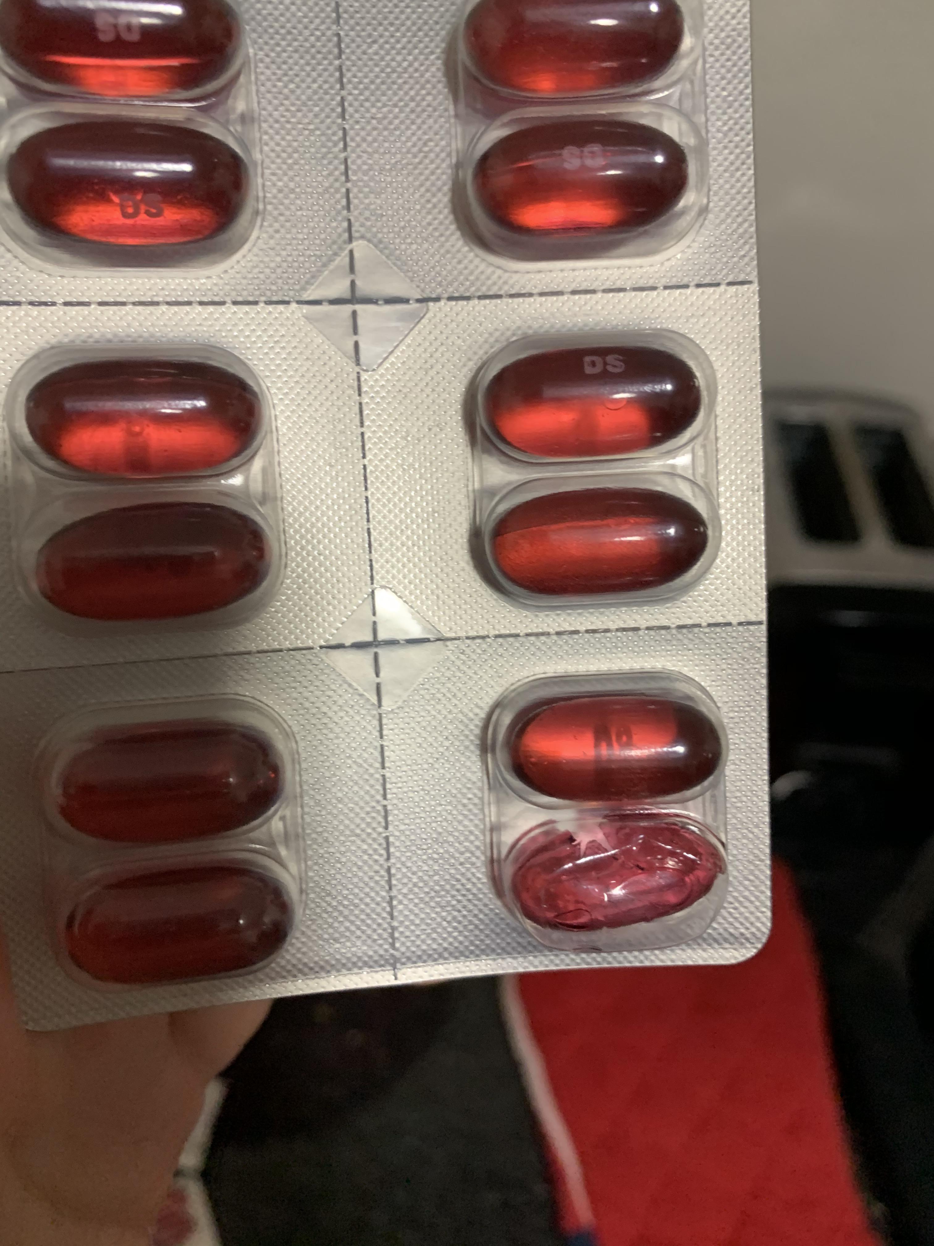 I opened my 9 box of DayQuil to find one of the 24 pills completely