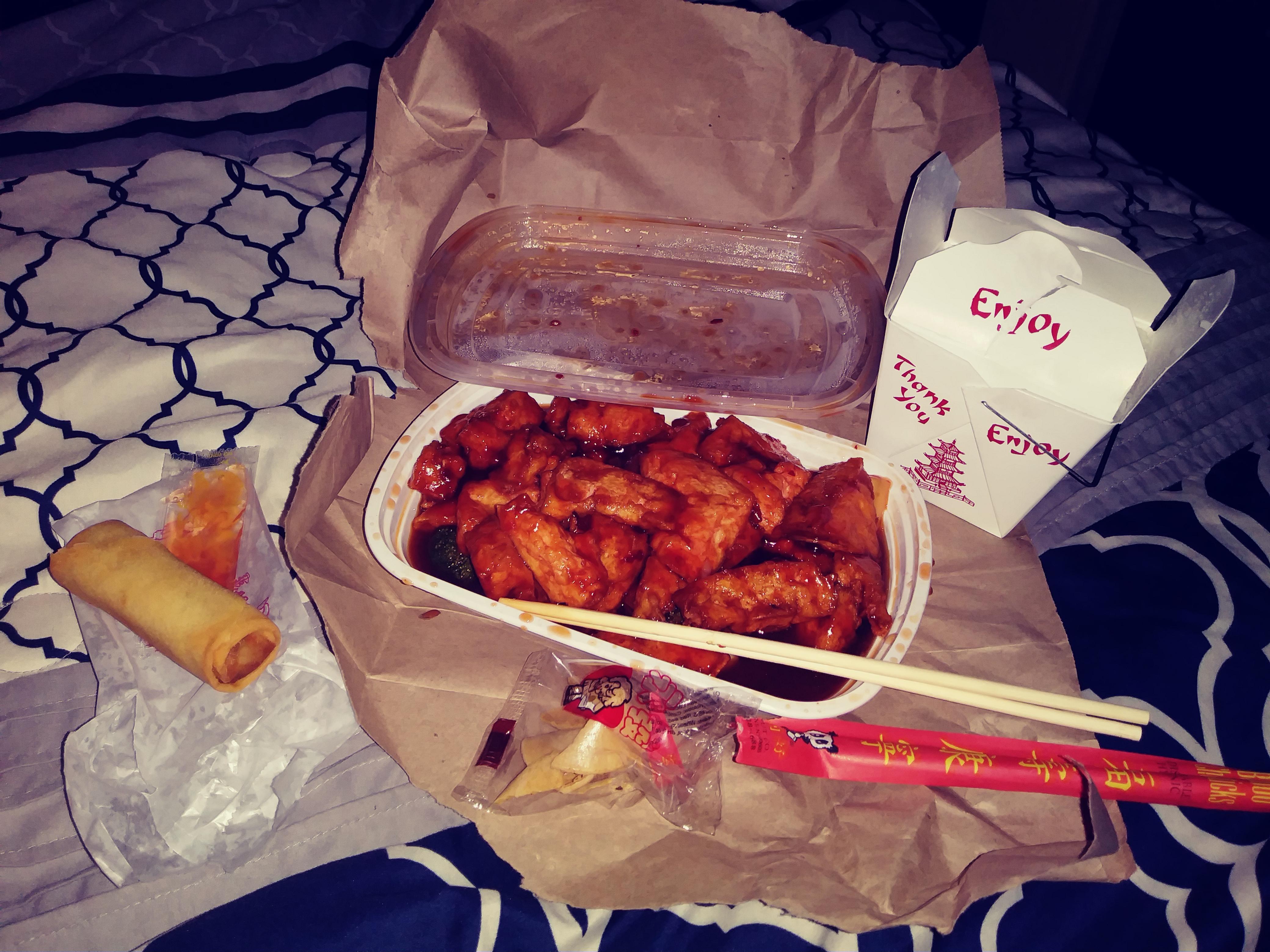 General Tso's bean curd with white rice and spring roll... Eaten on my