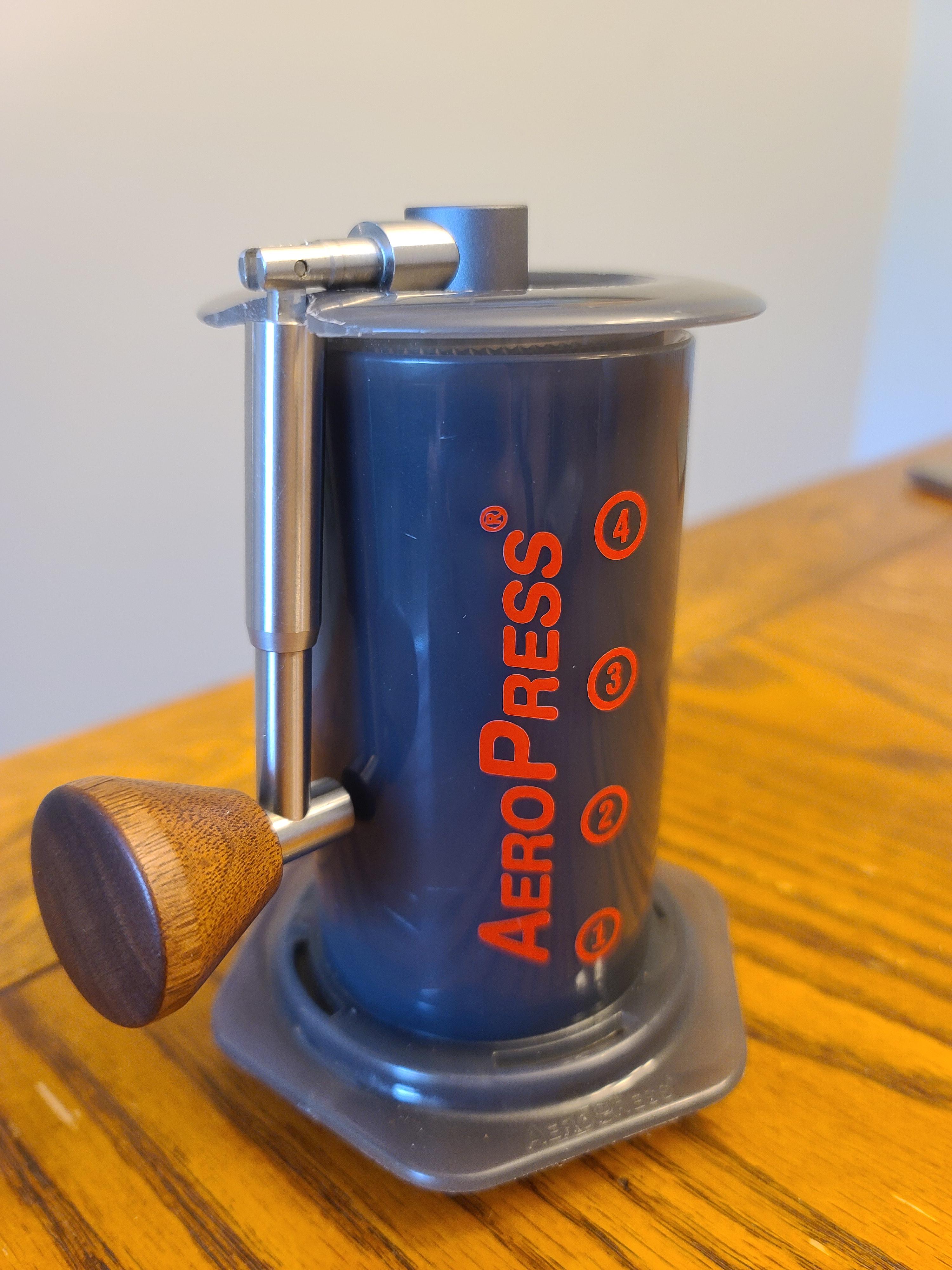 Fits like a glove. Notch cut into press for Timemore Nano Grinder. r