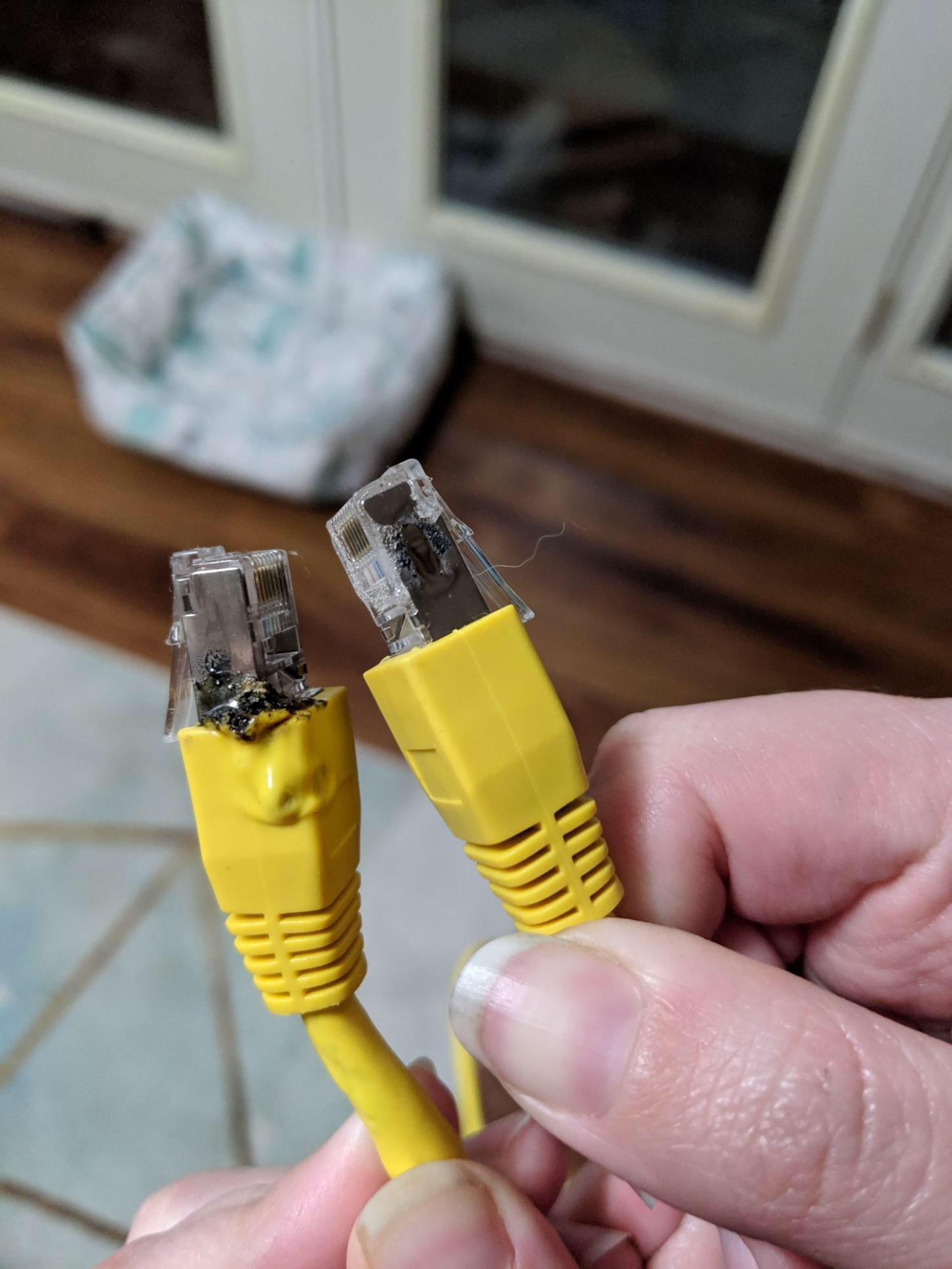 Brand new cable included with Nighthawk R6900P fried & melted