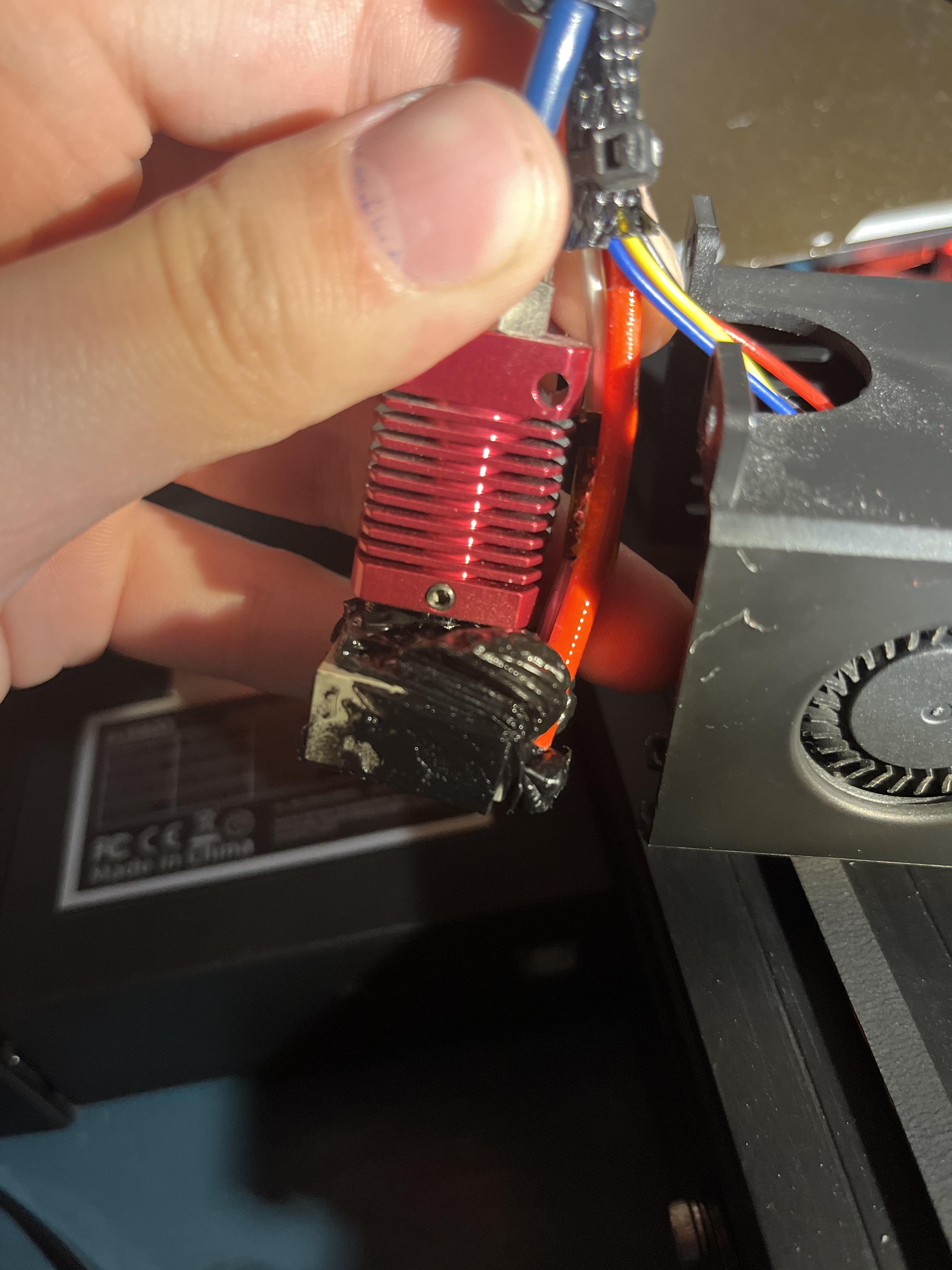 Filament clogged in the extruder and exploded around the heating