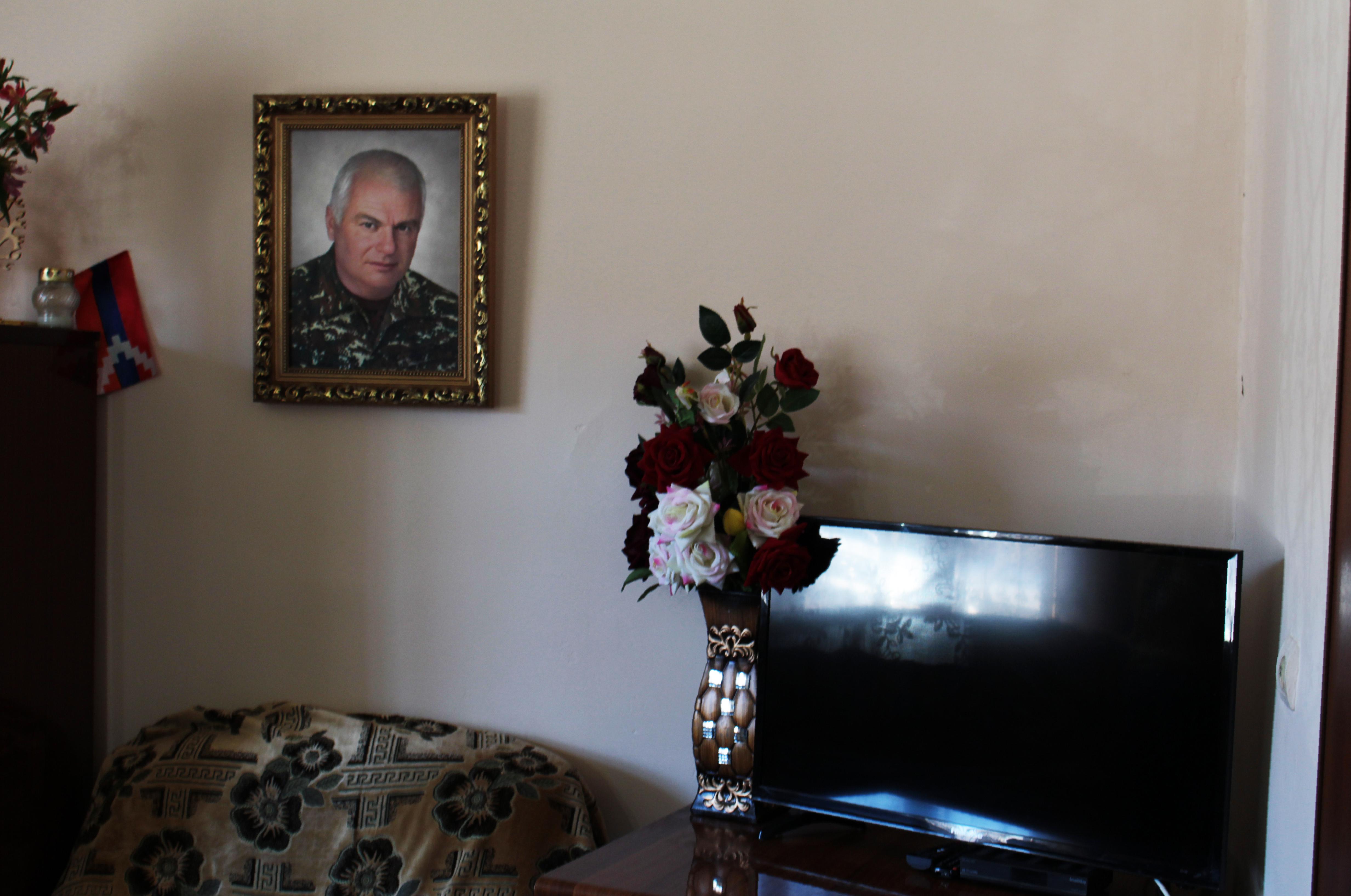 A portrait of martyred Artsakh veteran Ararat Grigoryan hangs in his