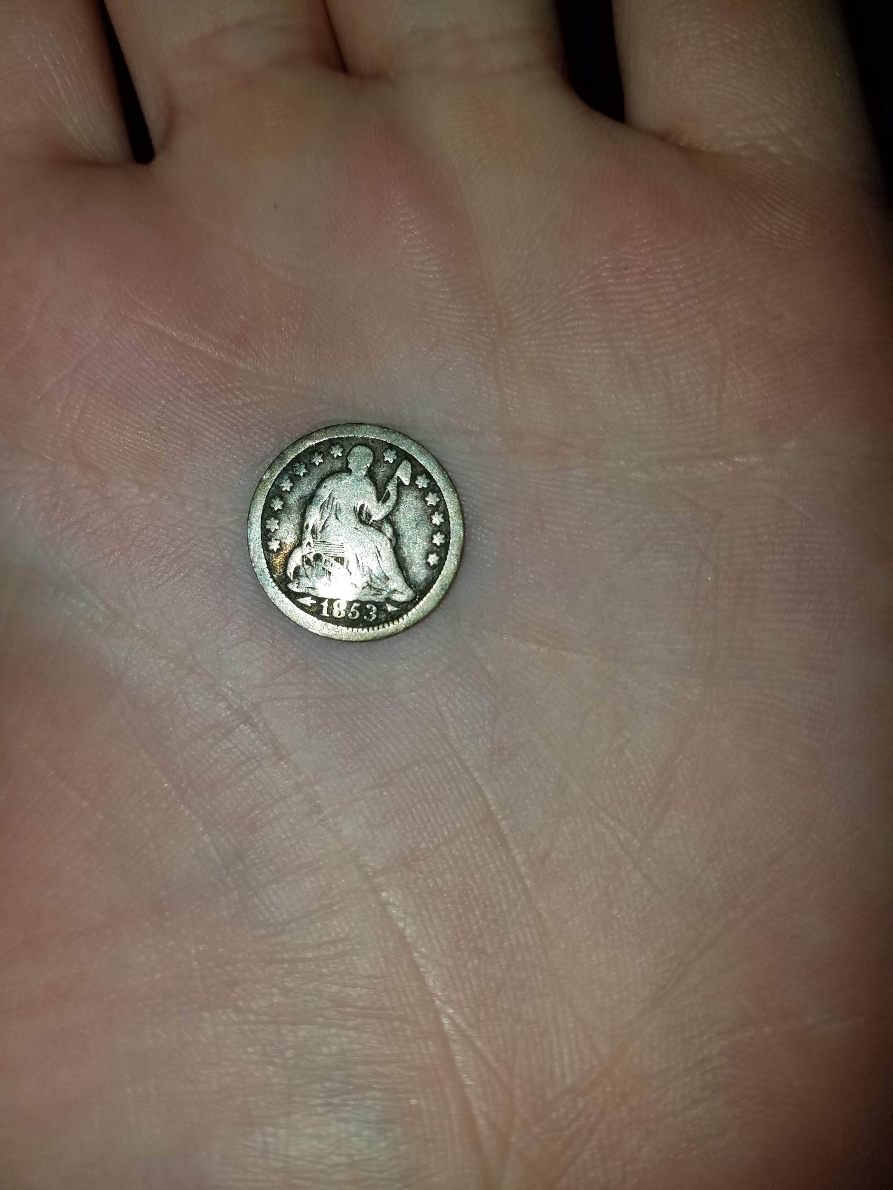 Found a US 1853 halfdime in a regular roll of dimes. r/mildlyinteresting