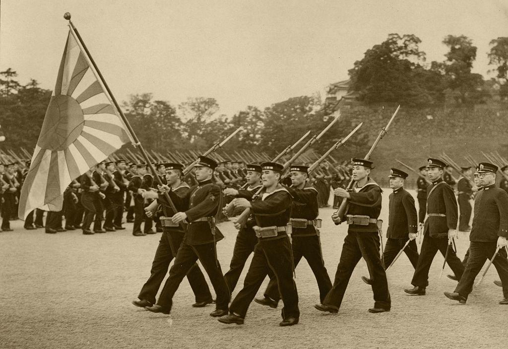 Japanese Navy honor guards rehearse at the Imperial Palace ahead of the