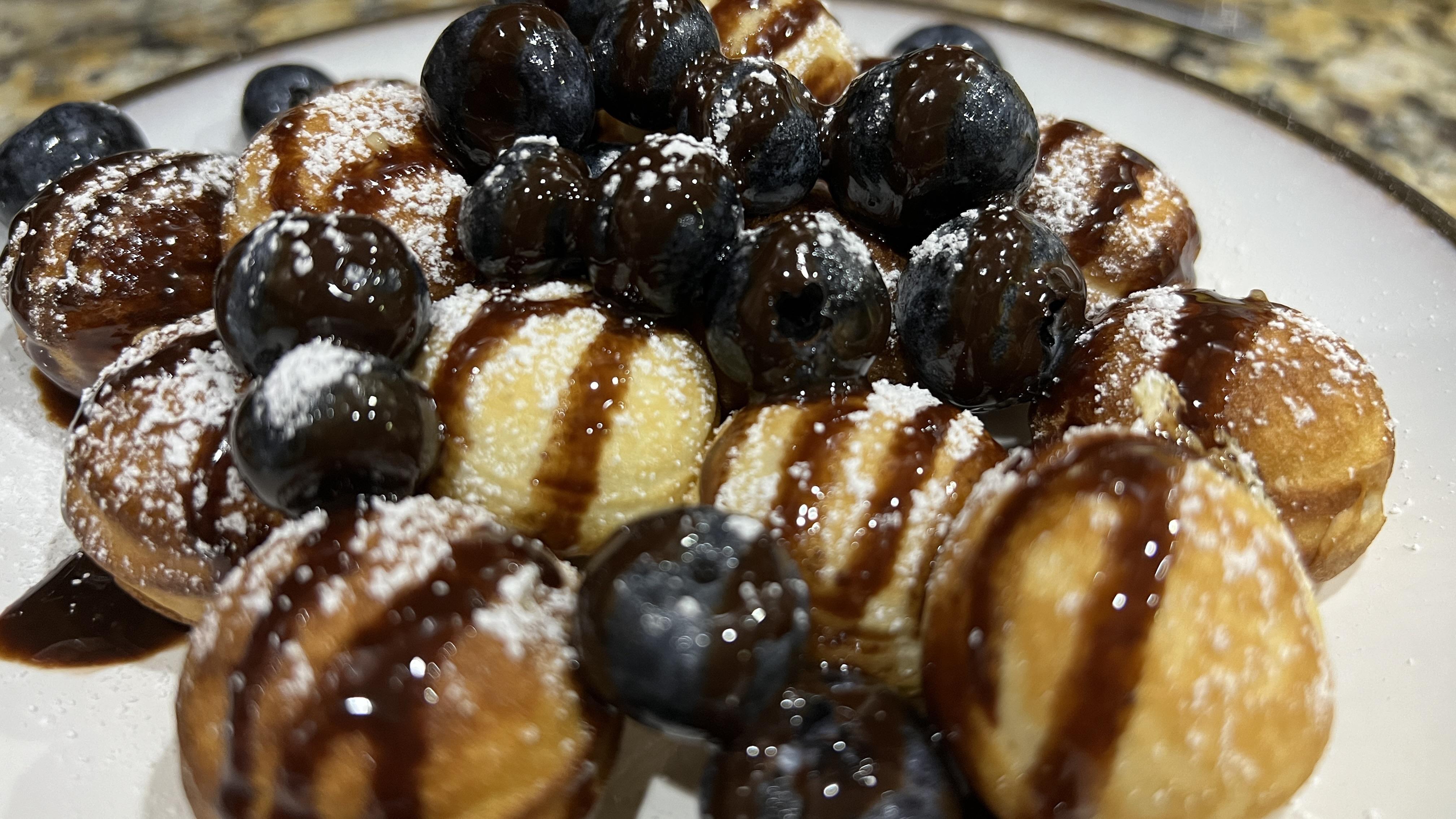 [homemade] Pancake balls with blueberries, drizzled chocolate and