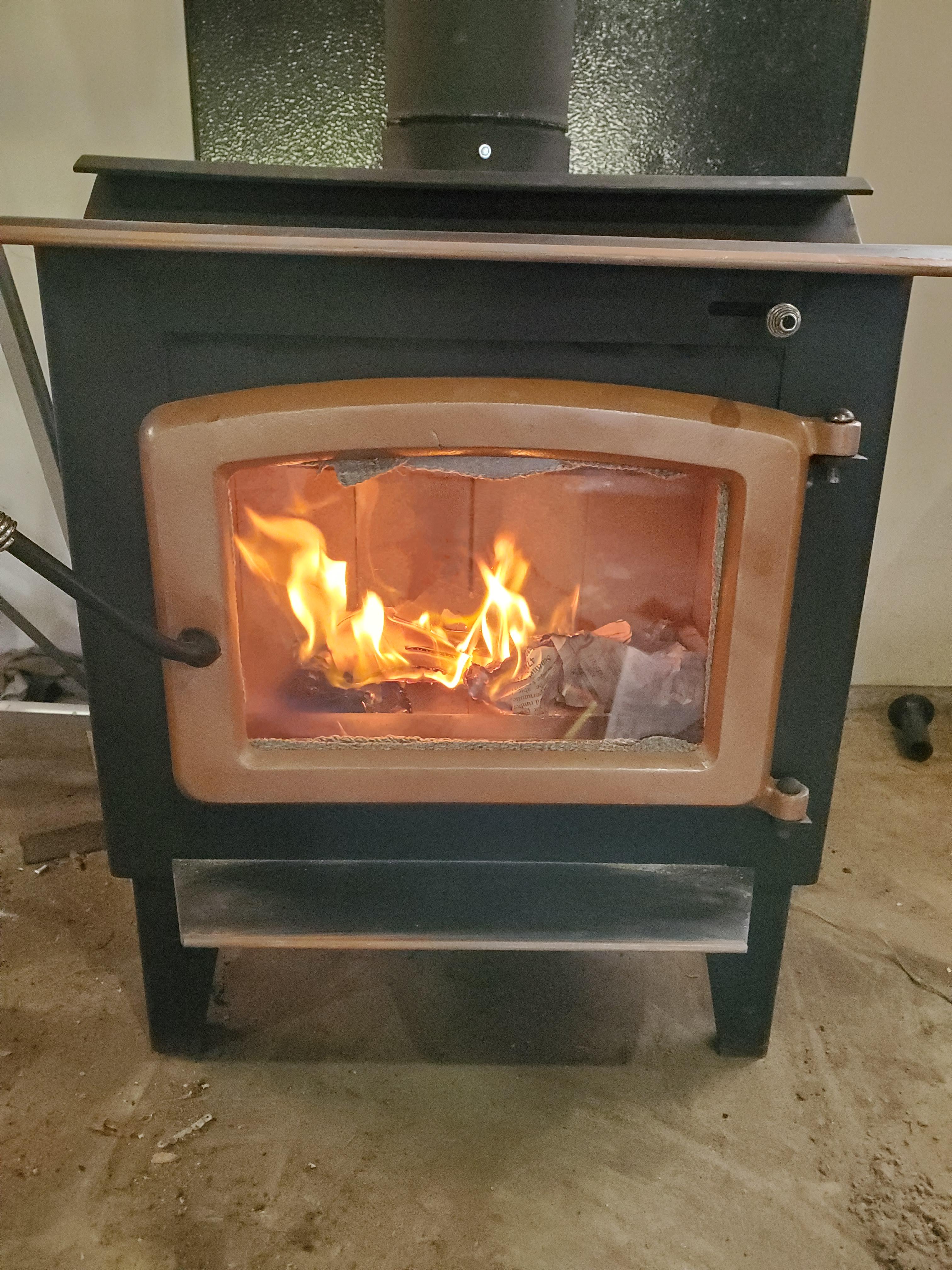 I set up my free standing wood stove in the garage. I can get the fire