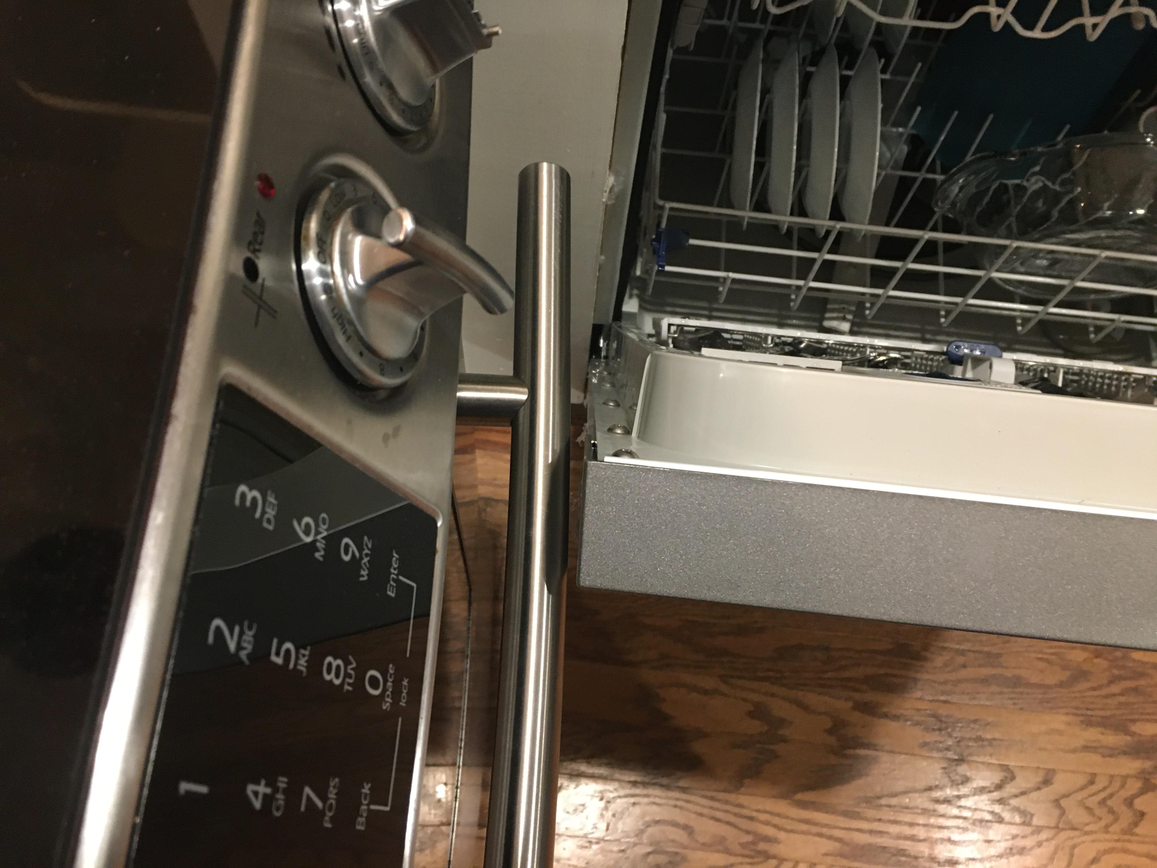 In my new house the dishwasher door opens with juuuuust enough space to