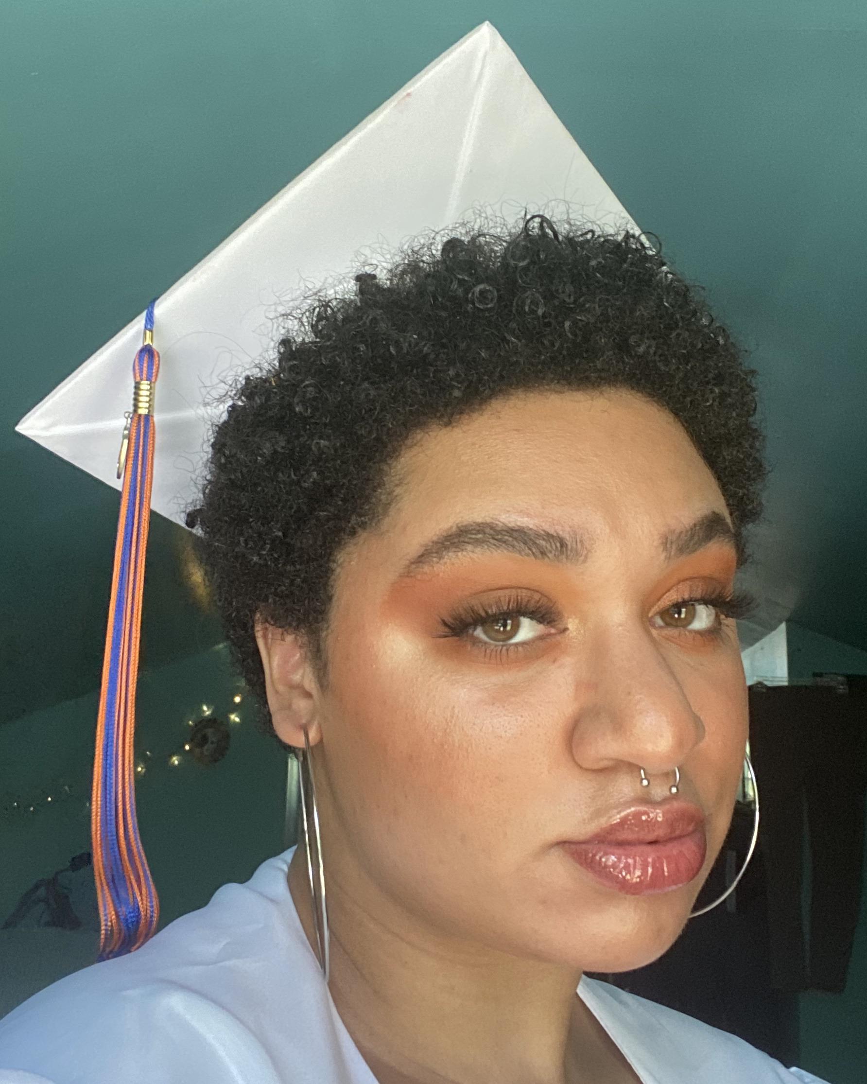 graduated high school yesterday, i like how my natural hair looks under