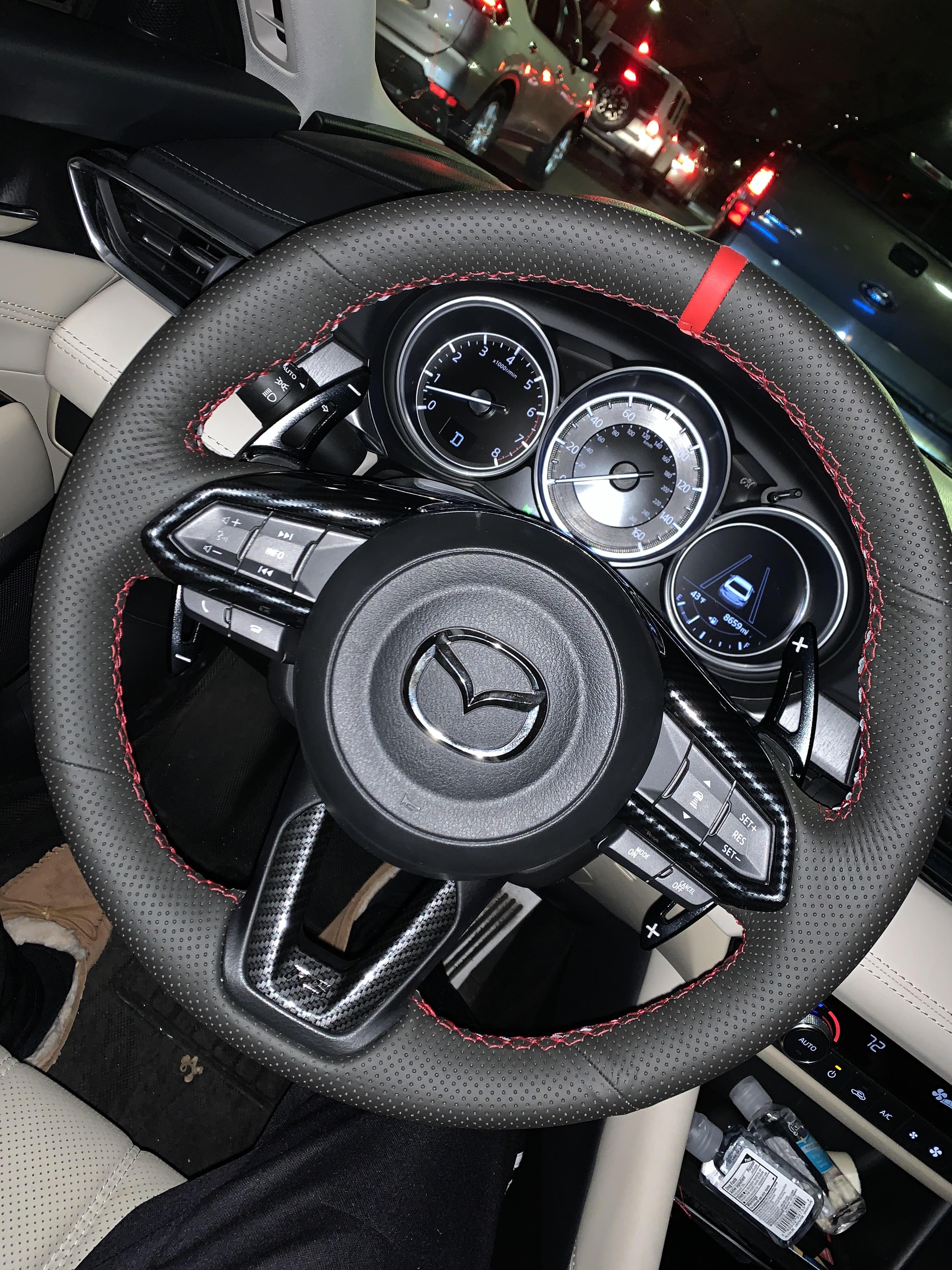 Hand stitched custom steering wheel for the Mazda 6. Done by me. r/mazda