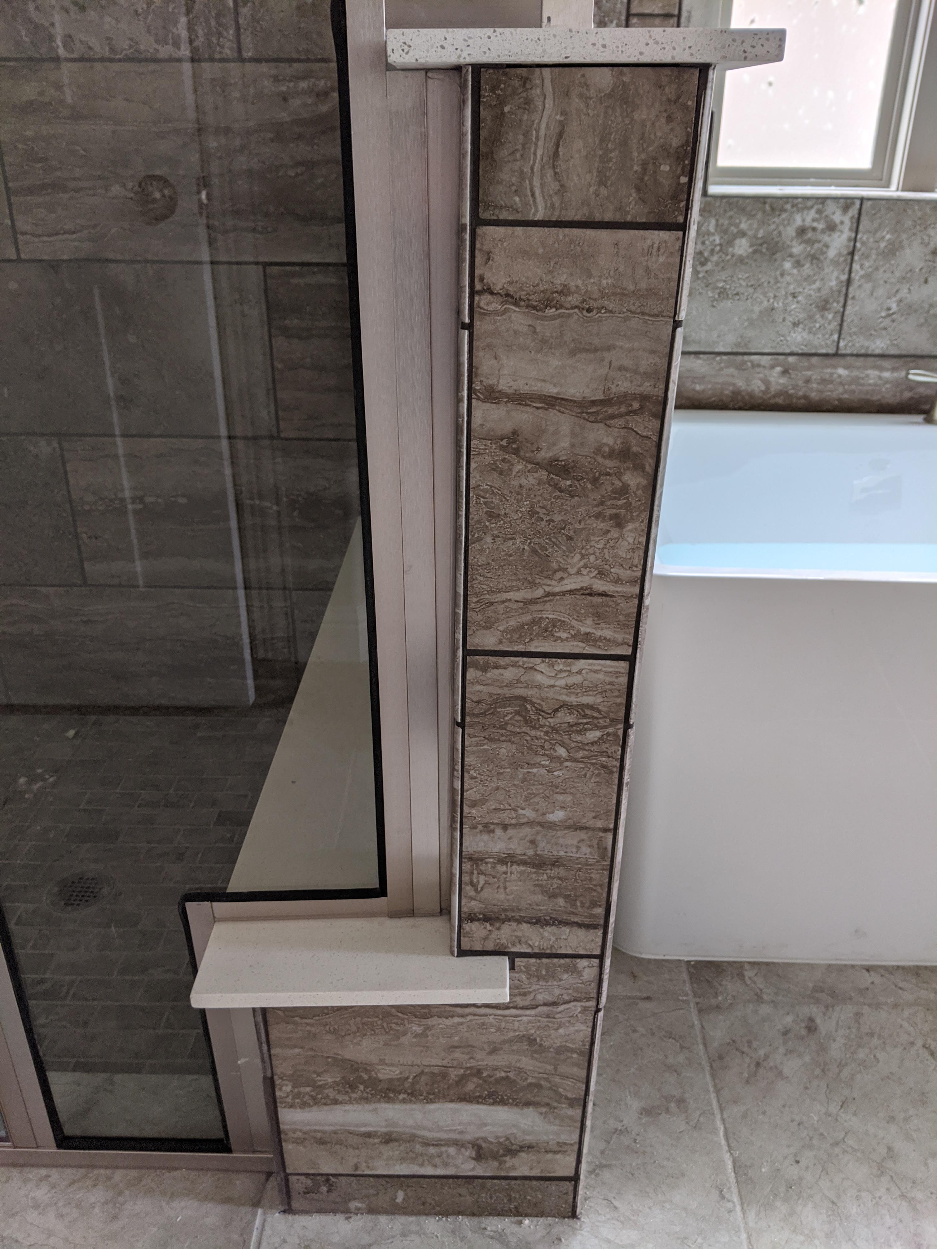 Crooked shower wall. Is this something the home builder should fix