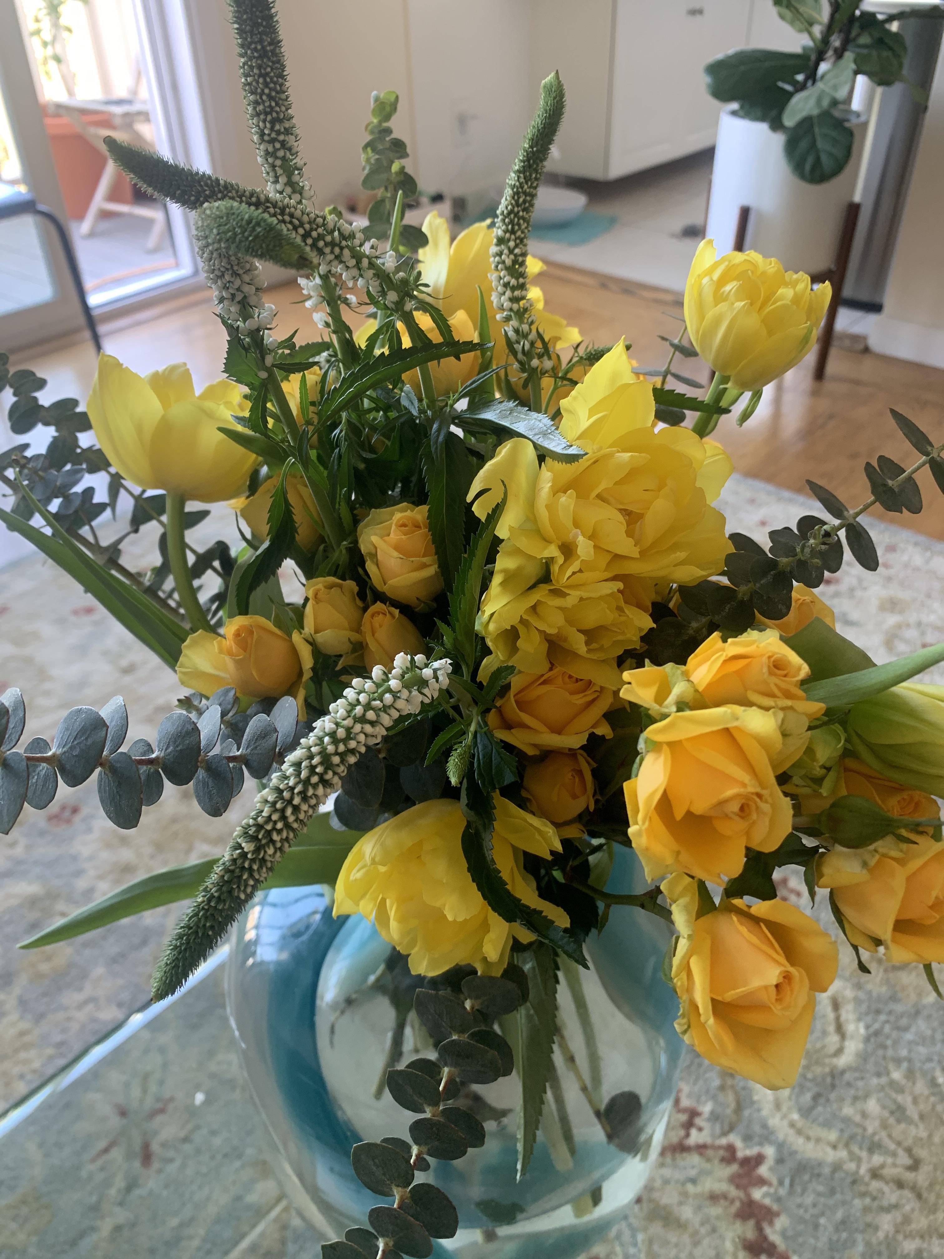 A yellow arrangement to brighten up my living room. The double blooming