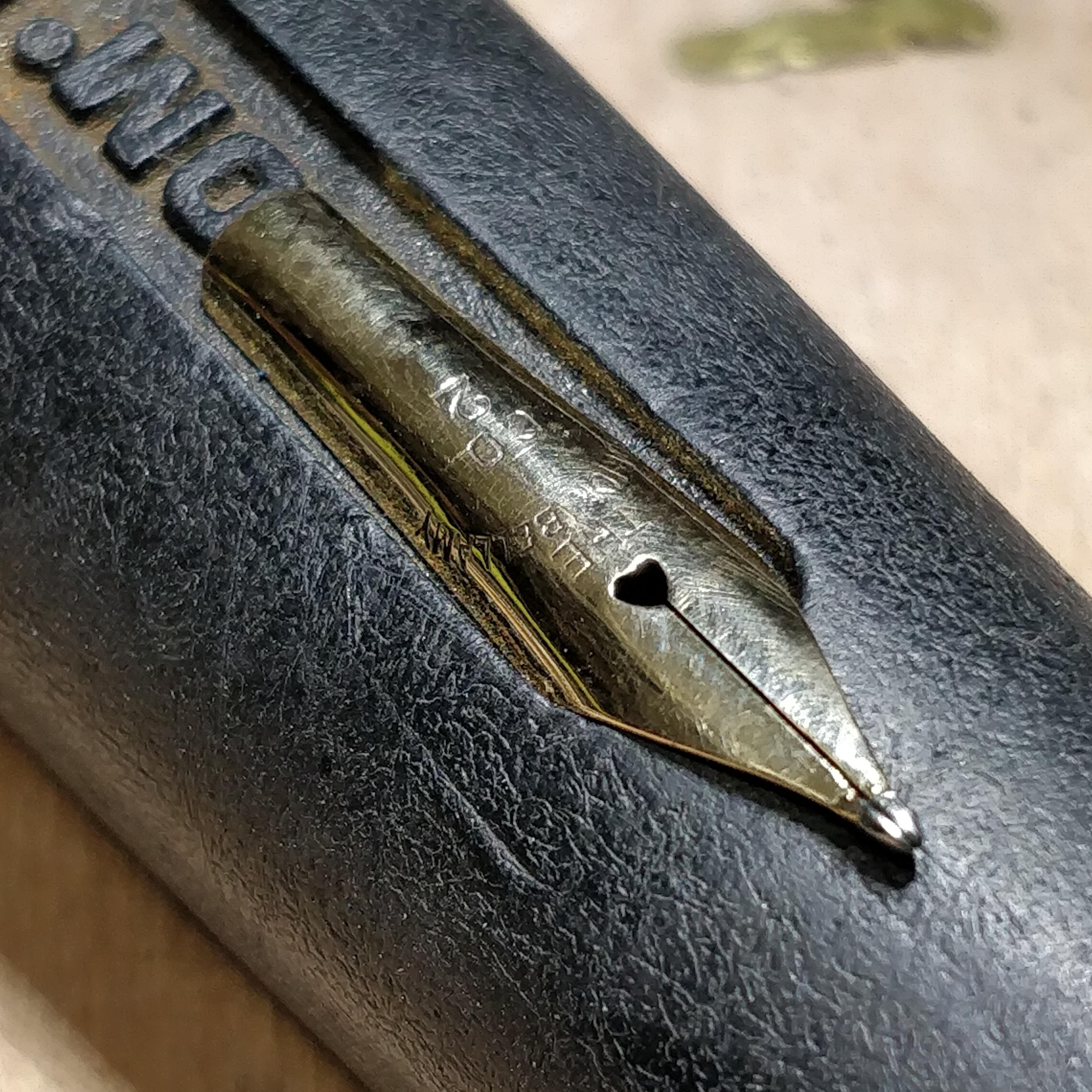 This is my first legitimate gold nib retipping. It's imperfect, and I