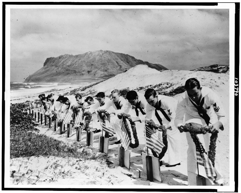 US Sailors honor men killed during the December 7, 1941, Japanese