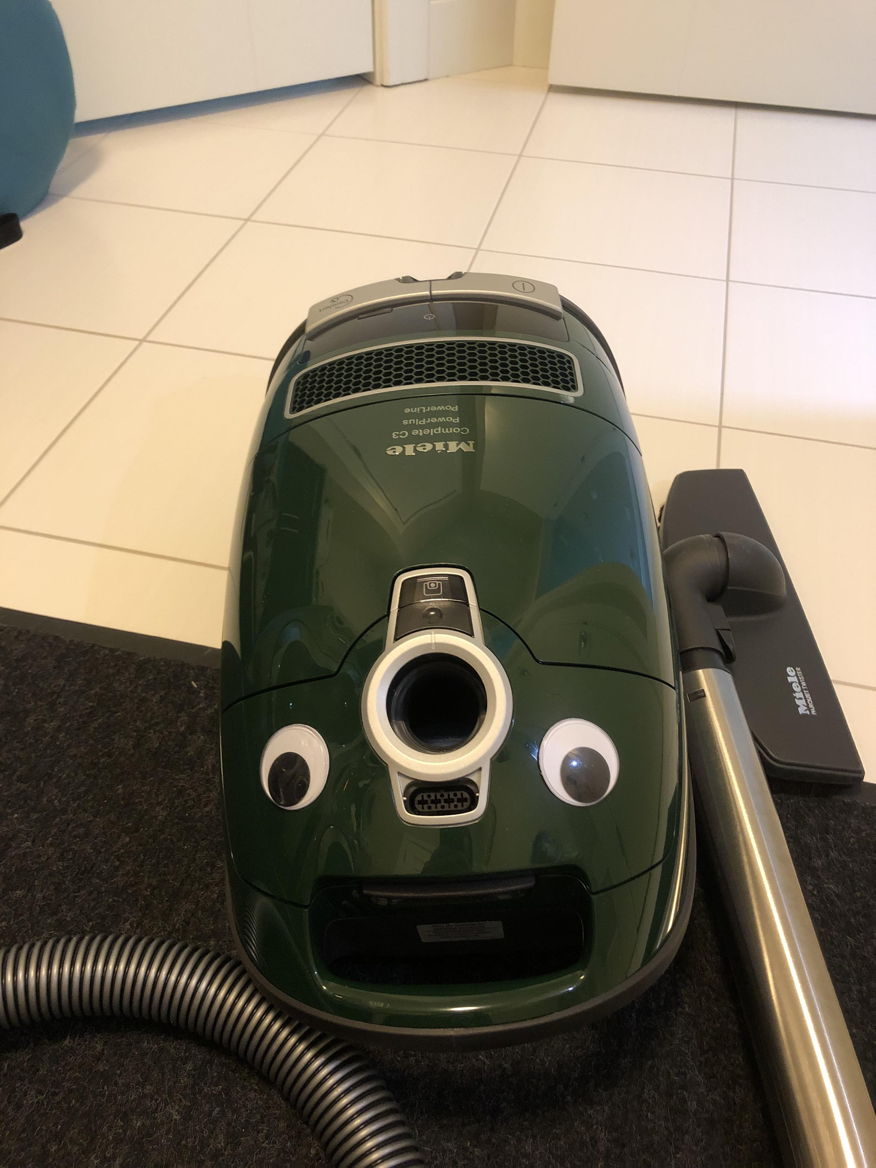 My wife stuck googly eyes on our vacuum cleaner r/pics