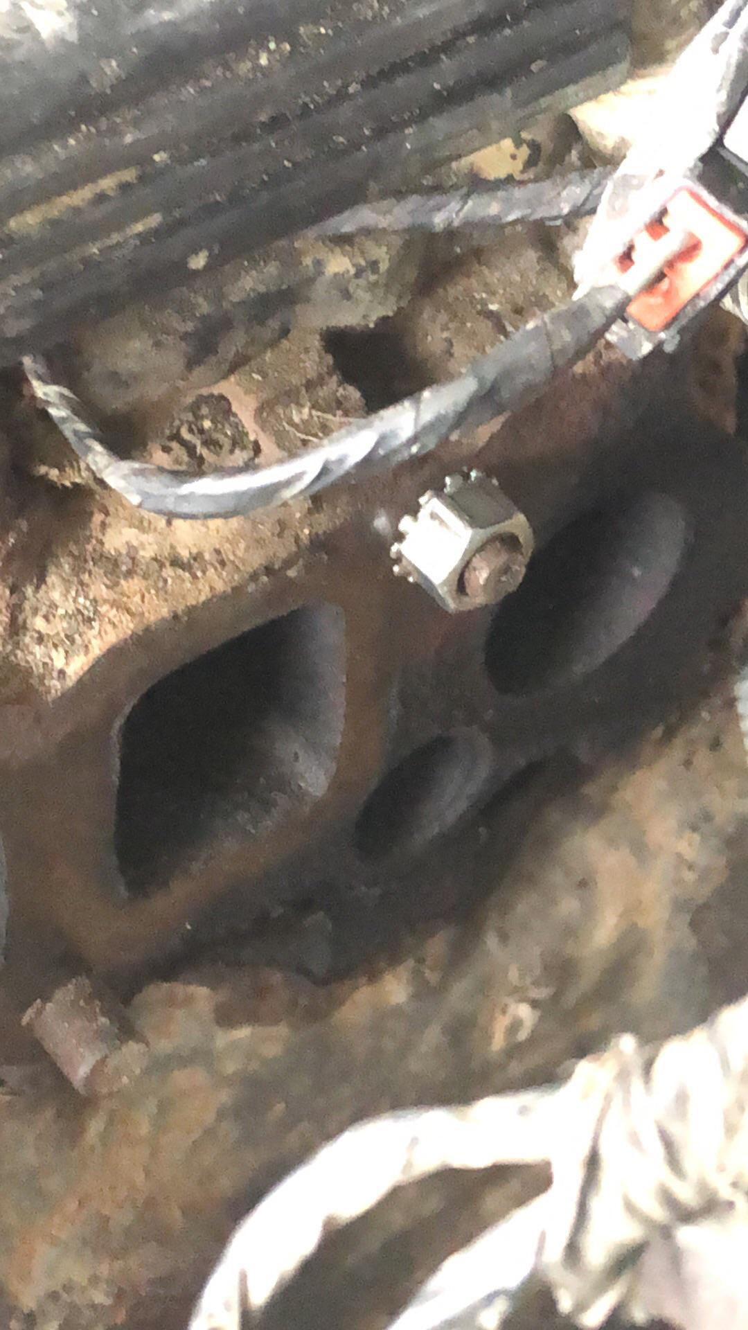 Bolt broke off exhaust manifold. Any good ideas besides drilling into