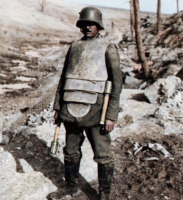 German soldier in full body armour, holding a stielhandgranate in 1918