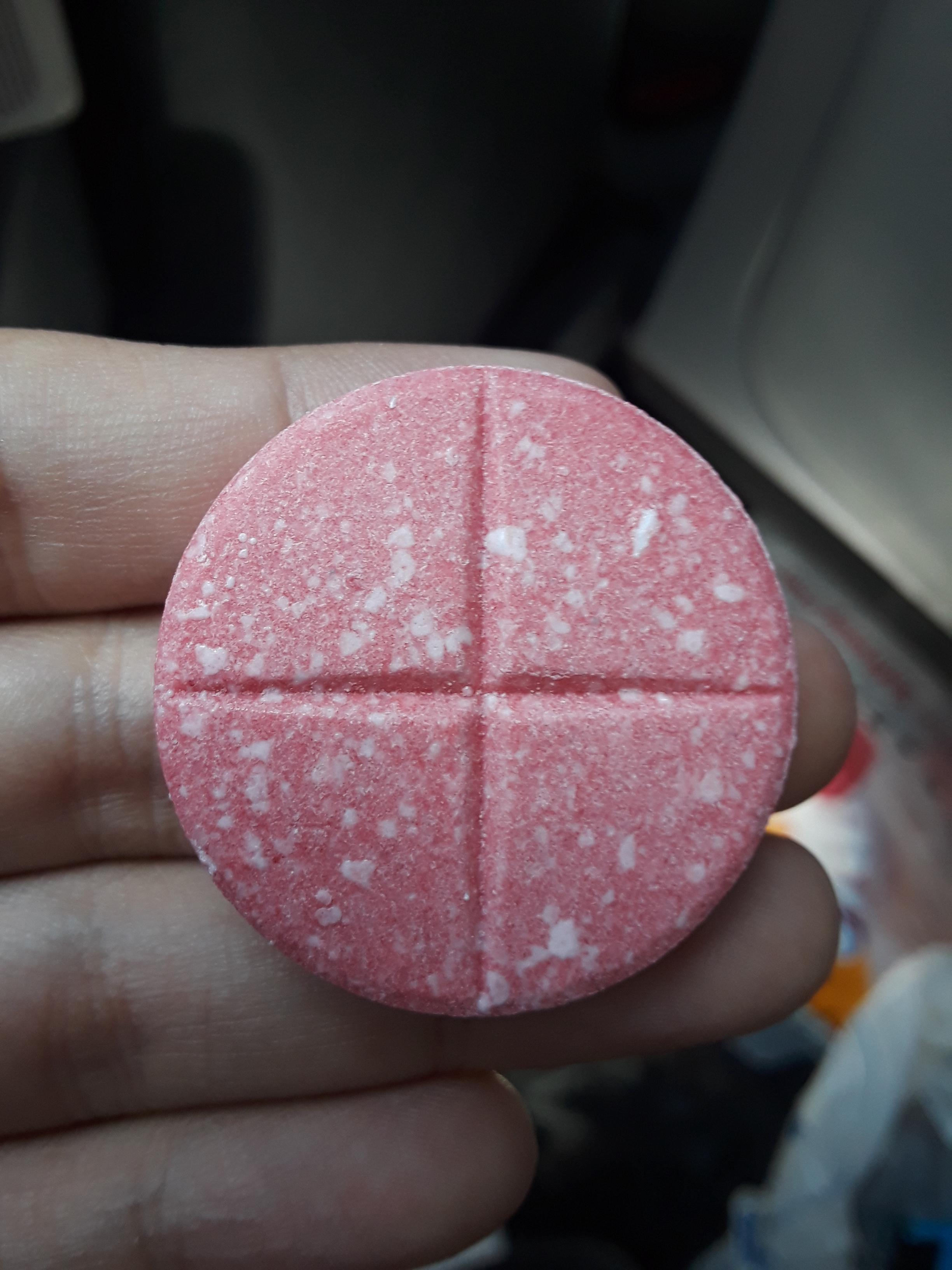 White dots all throughout my Giant Chew Sweet tarts. Not past exiration Date and no notable