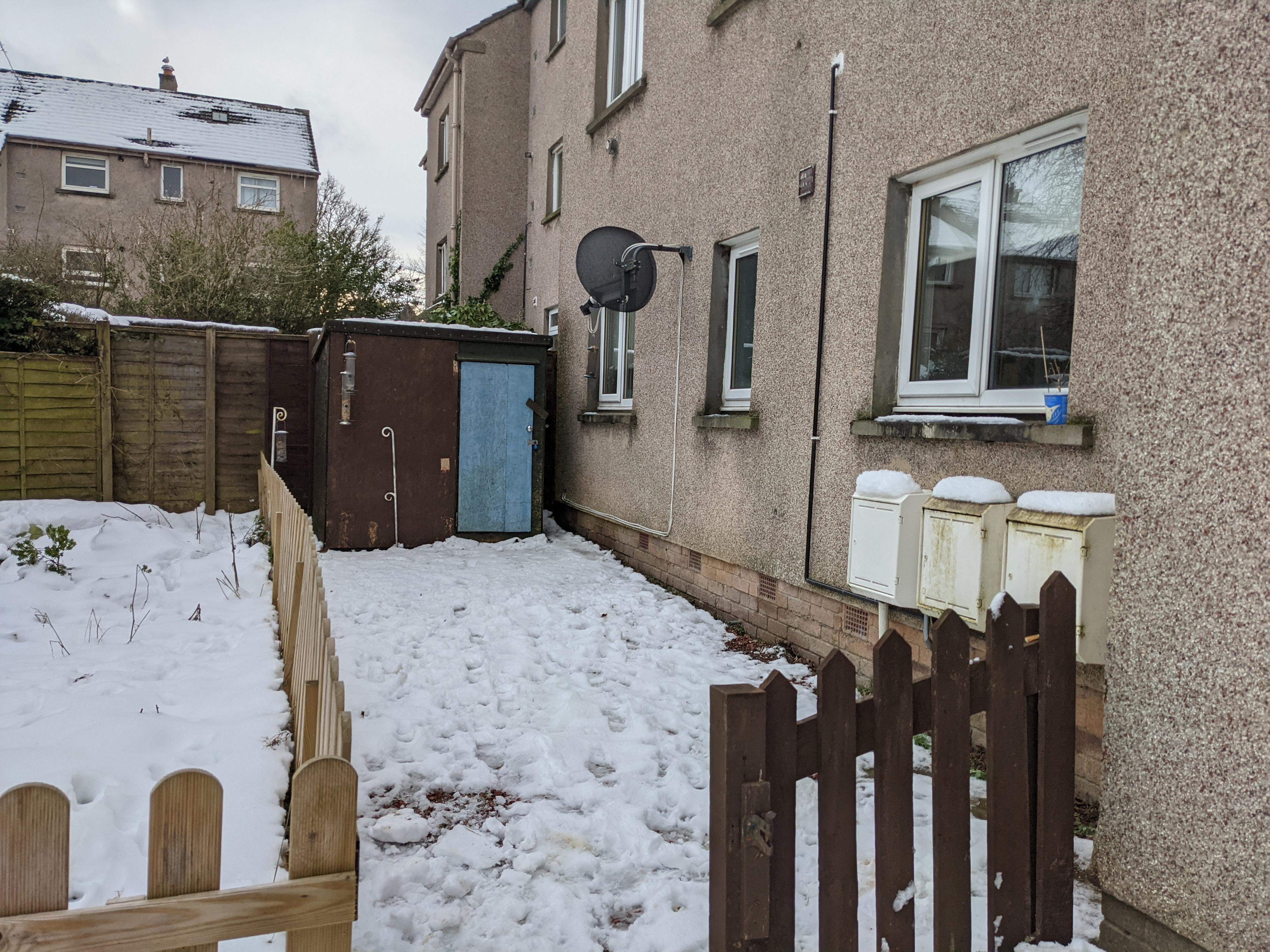 Ideas to transform this shady gravel patch into a nice place to drink