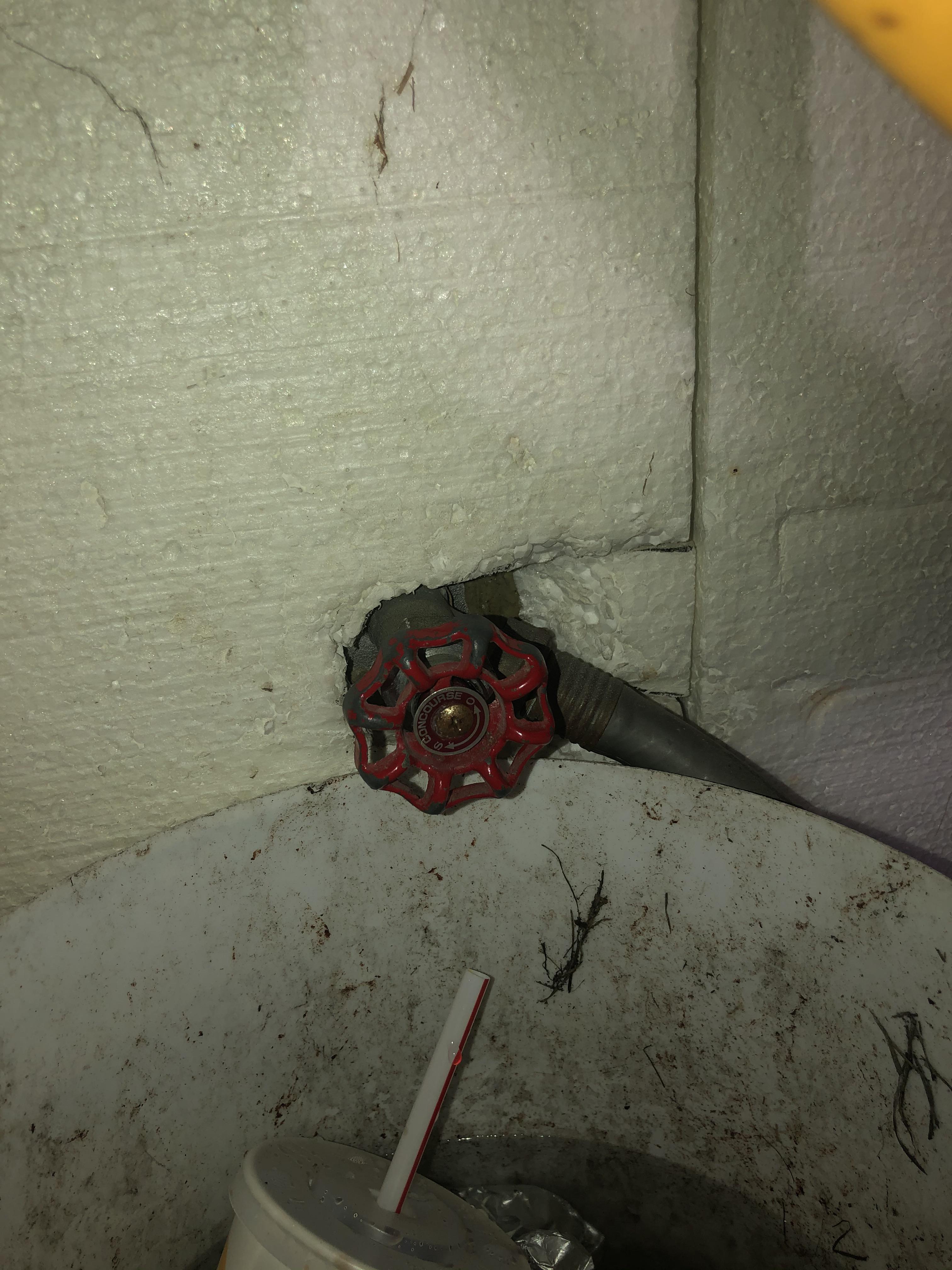 How do I fix this leaking garage faucet? When I try to tighten it, it spins indefinitely. I have