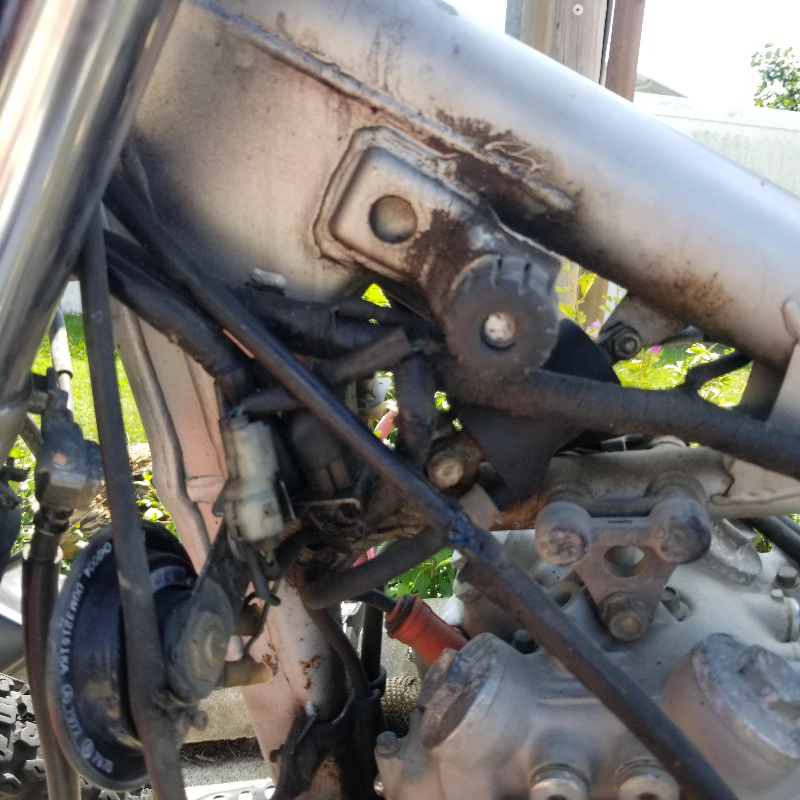 How do I reach this spark plug on honda nx650? r/Fixxit