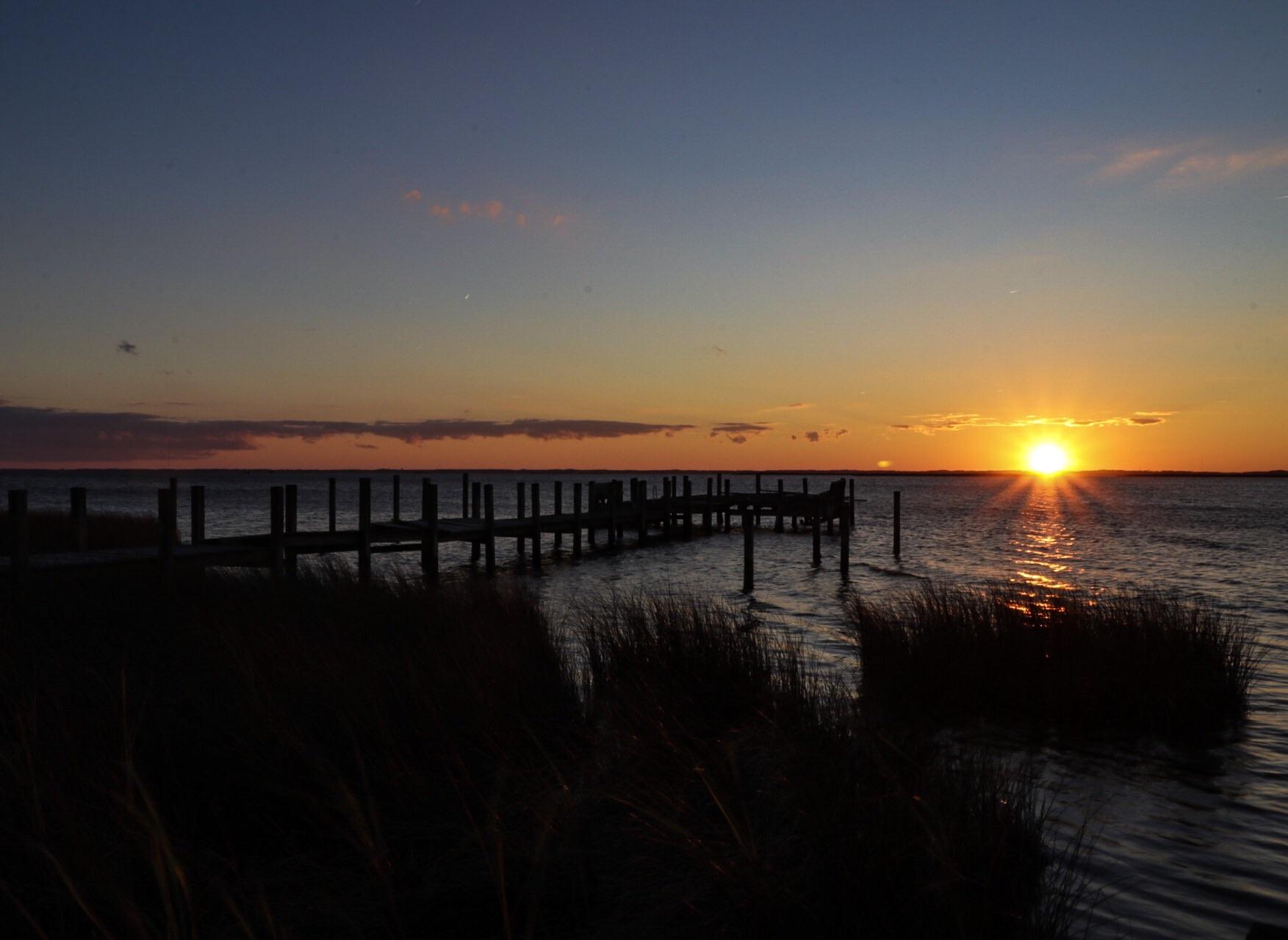 The sunset over the Currituck Sound in the Outer Banks, Duck, North