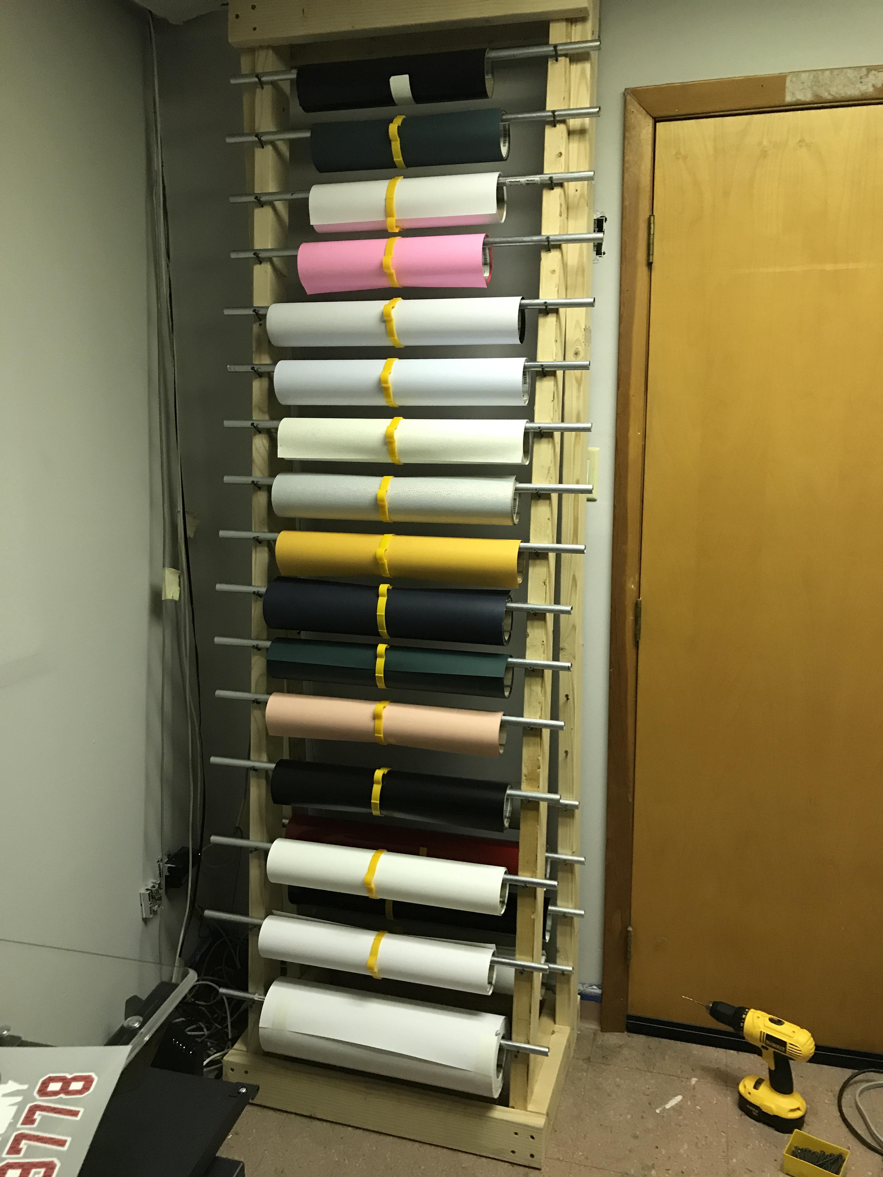 Slim, freestanding vinyl storage. I saw some similar things but they