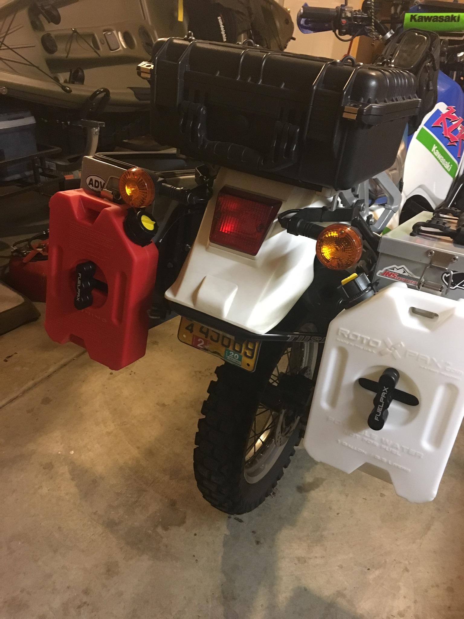 Rotopax water and fuel cells. Mounted on the back of panniers r/Dualsport