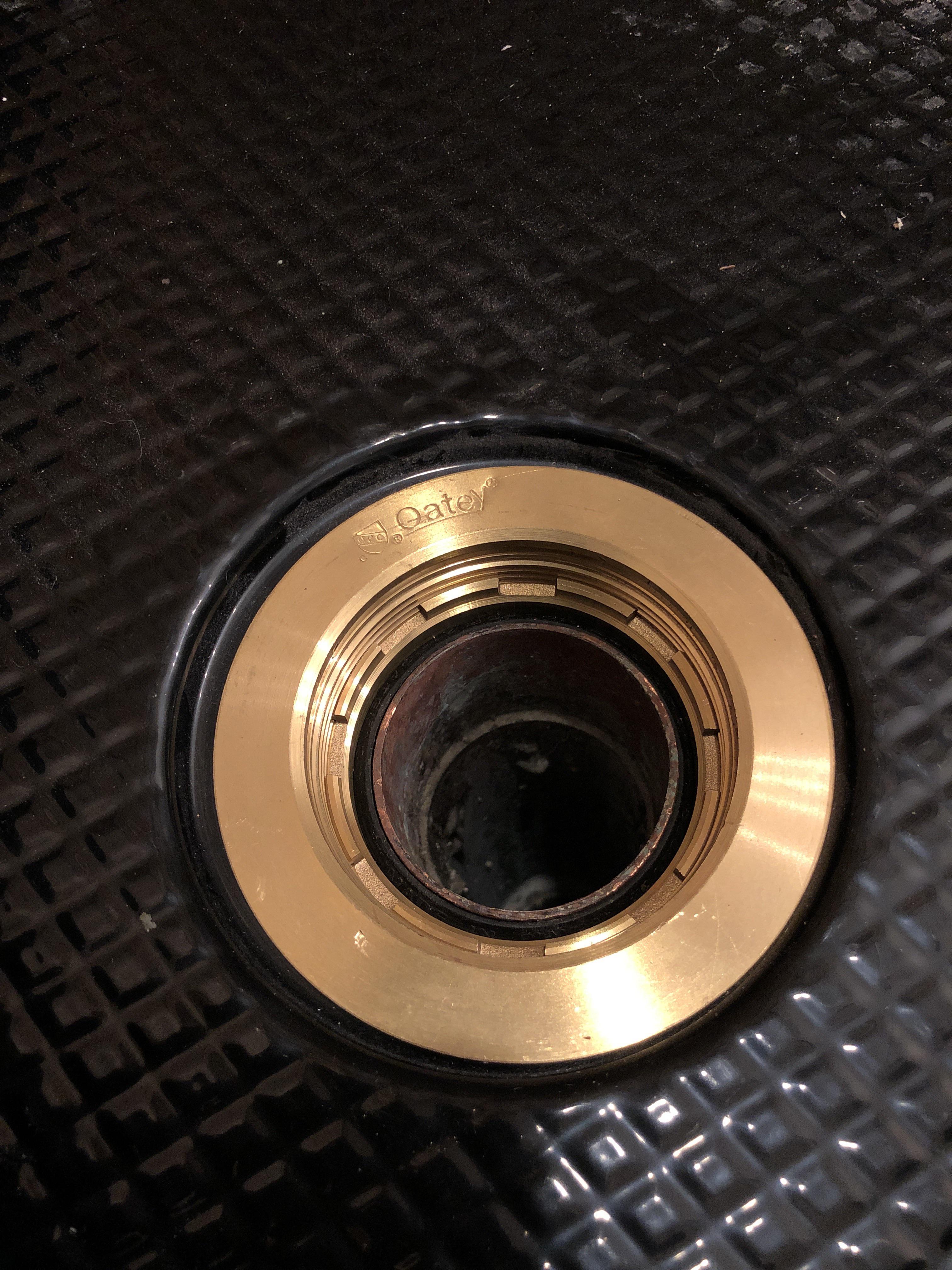 Shower drain, pre formed base. My copper pipe still does not seem