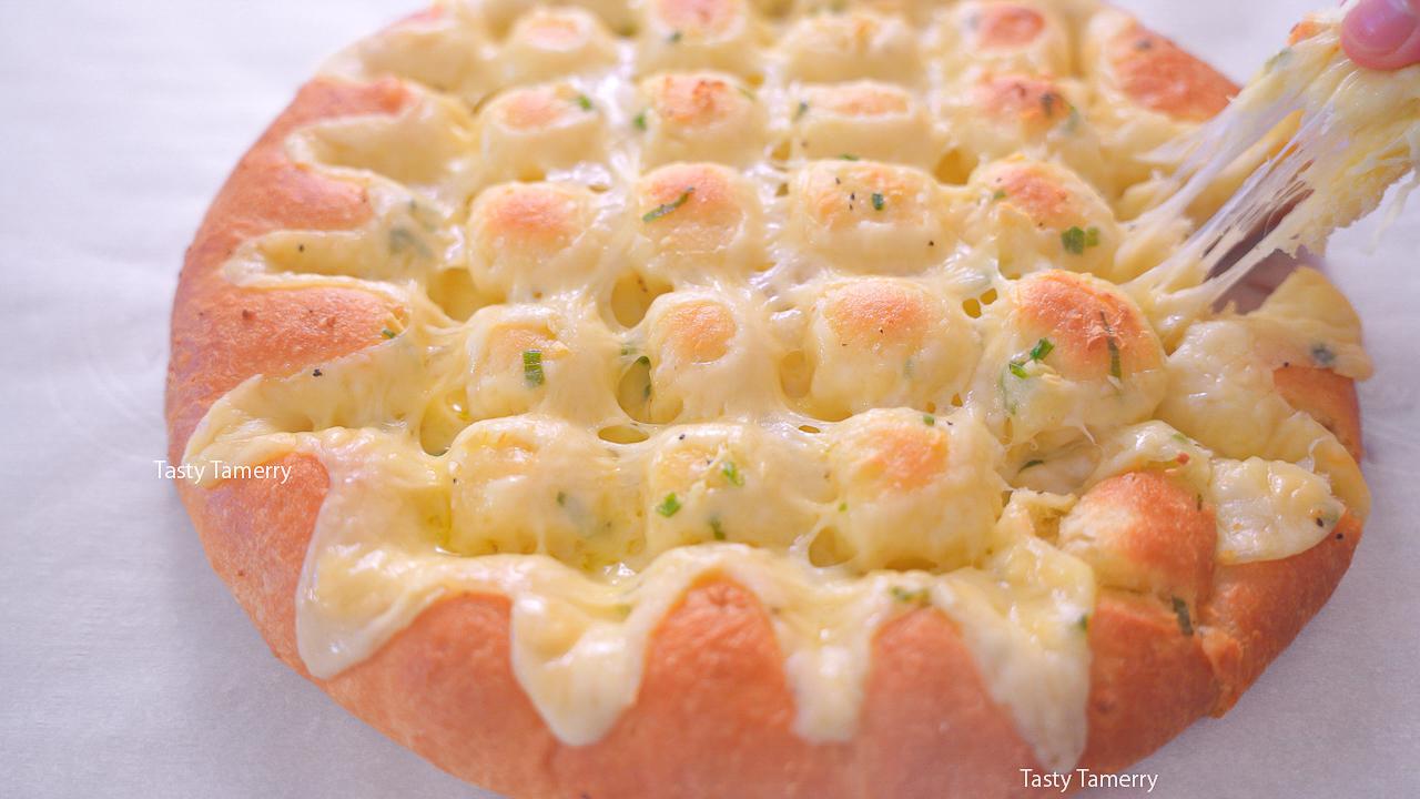 The ultimate soft, fluffy and super delicious cheesy garlic bread
