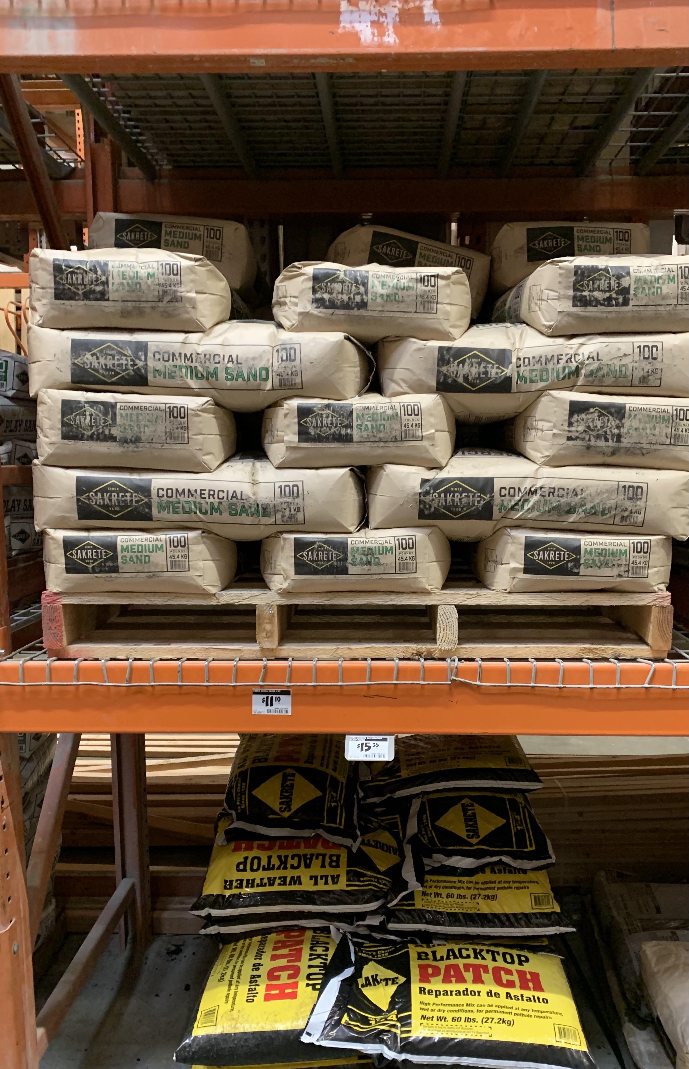 Thanks, Home Depot, for putting the 100 lb. bags of sand on the second