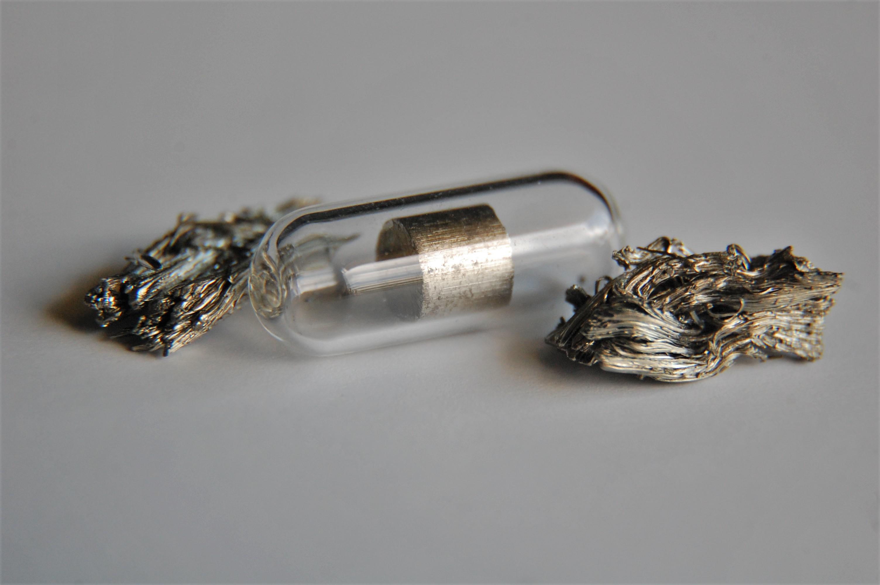 The lightest rare earth metal, scandium, in a cylinder and dendritic