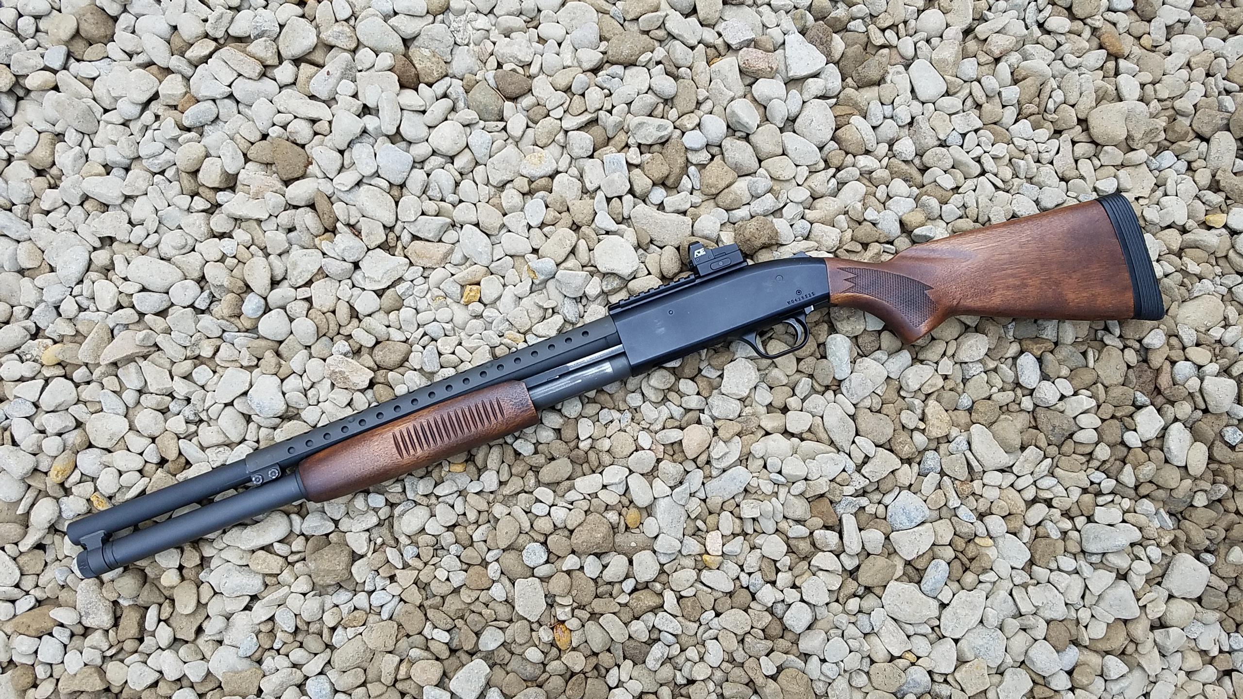 Mossberg 500 with shortened, refinished 13" wood stock and forend r
