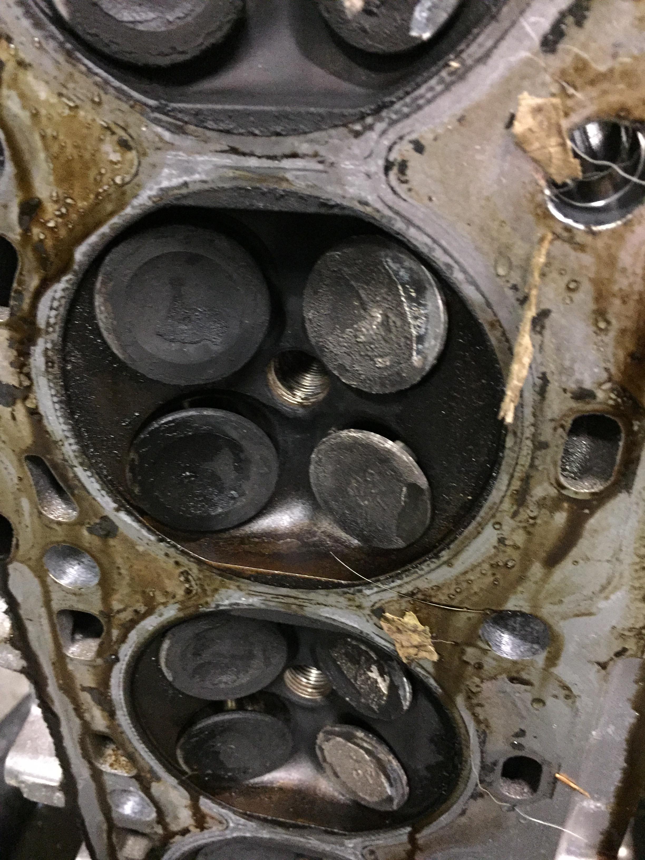 Bent valves. Whatcha think Machine shop or get a junkyard head to