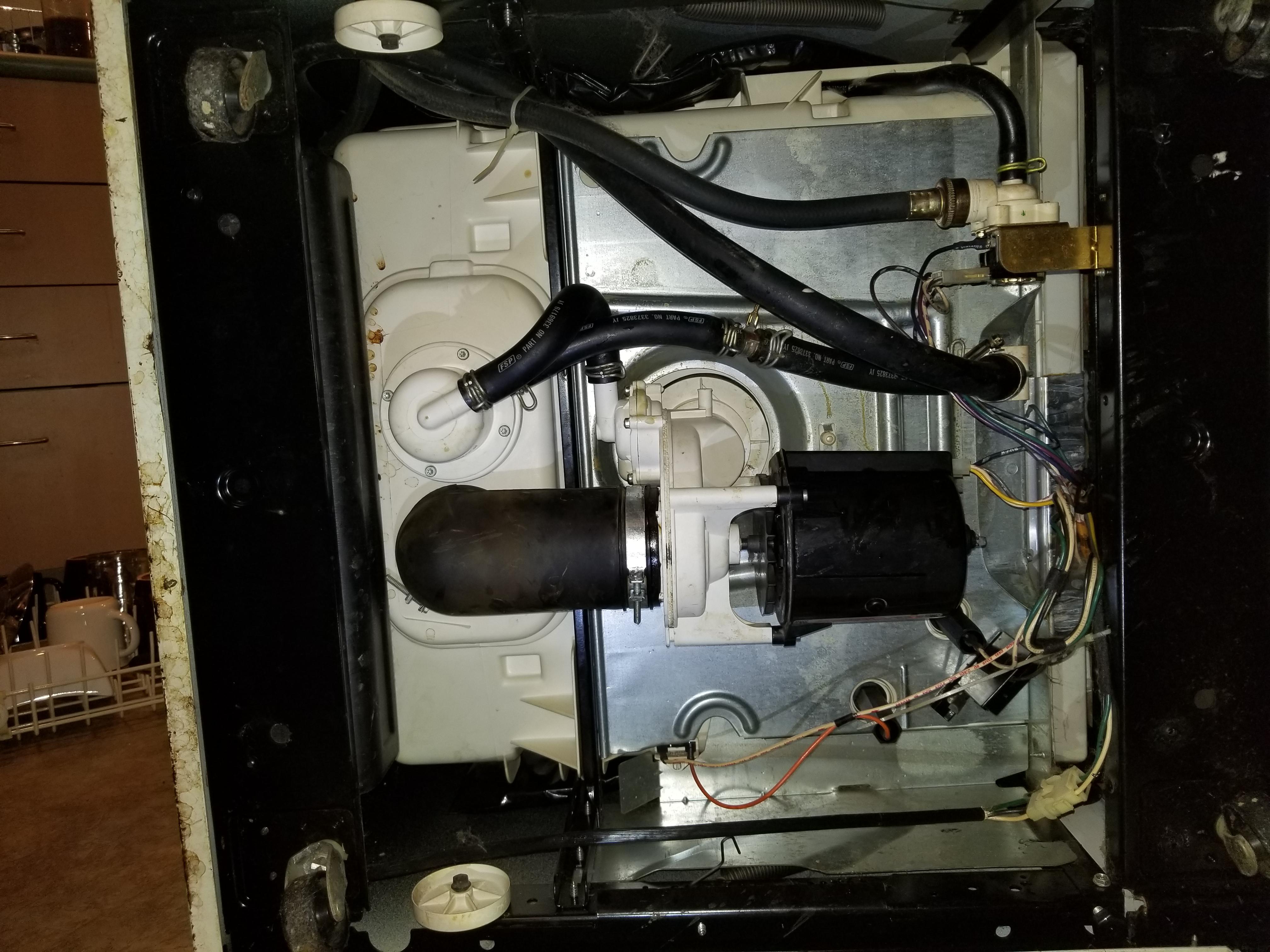 Please help. Underside of my portable dishwasher. Won't drain. Checked