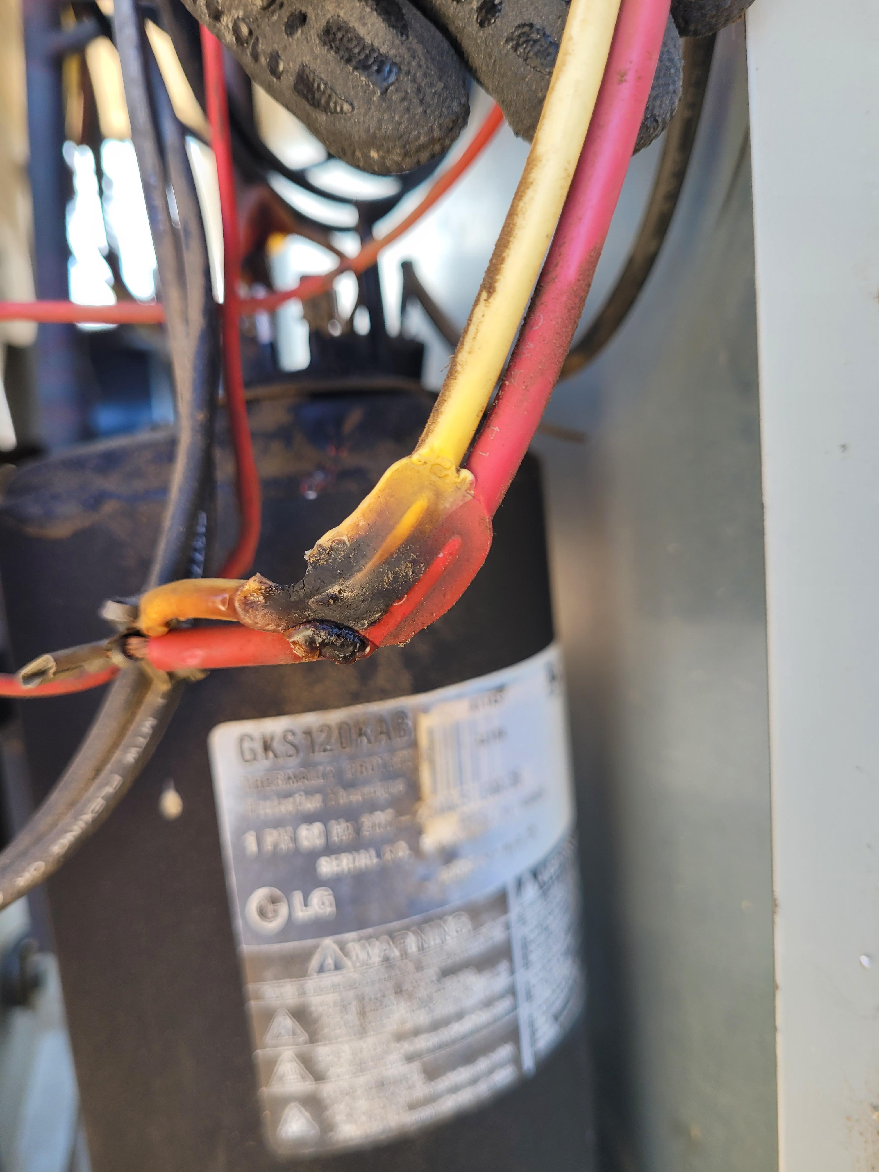 the wires to this grounded out compressor fused together looking like