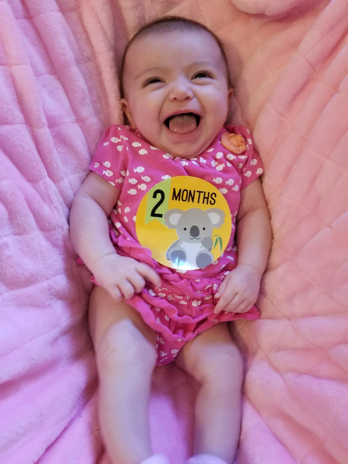 2 months old and smiling bigger than ever! r/happy