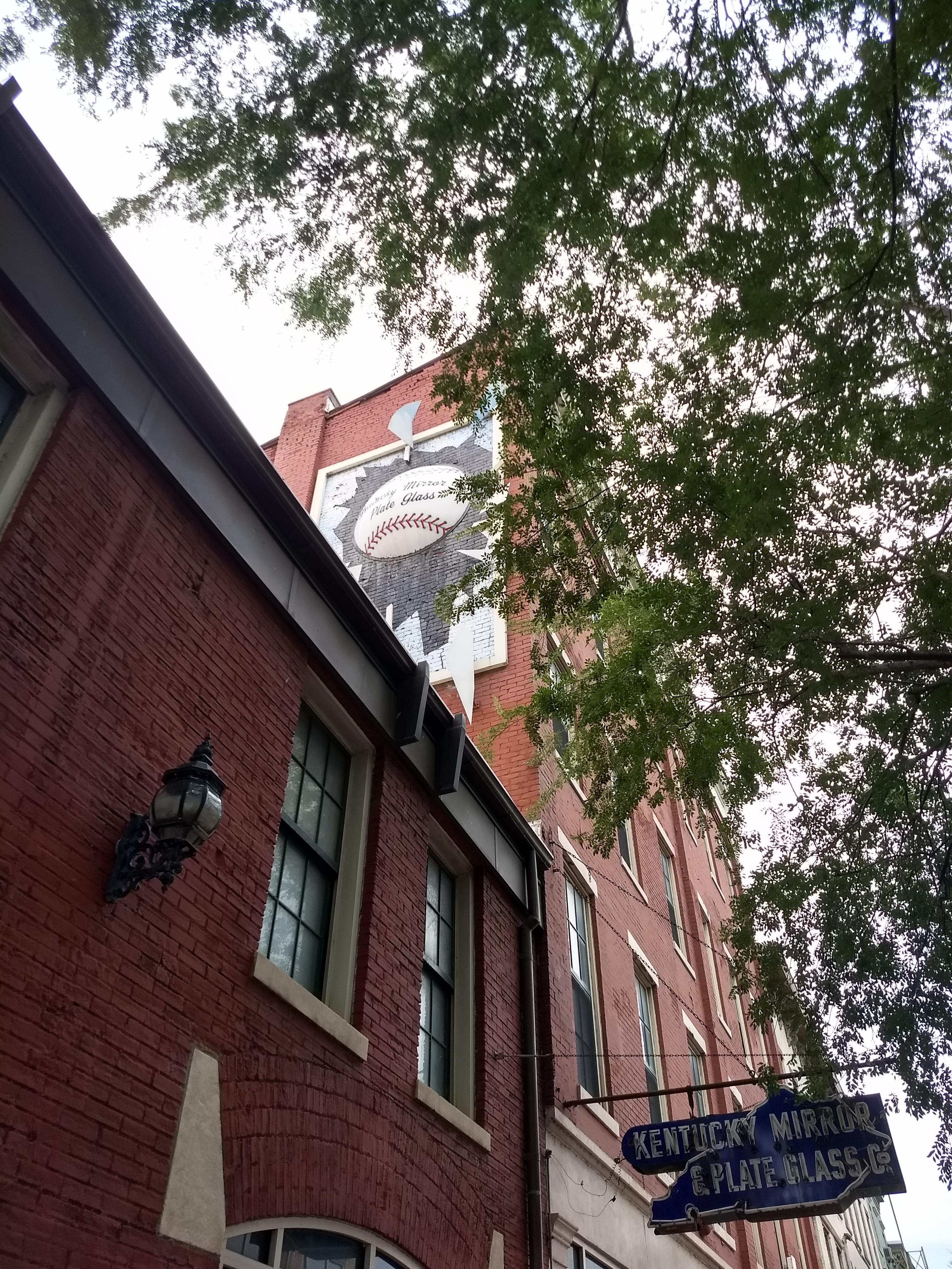 TIL this baseball was on the building beside the Slugger bat (Kentucky