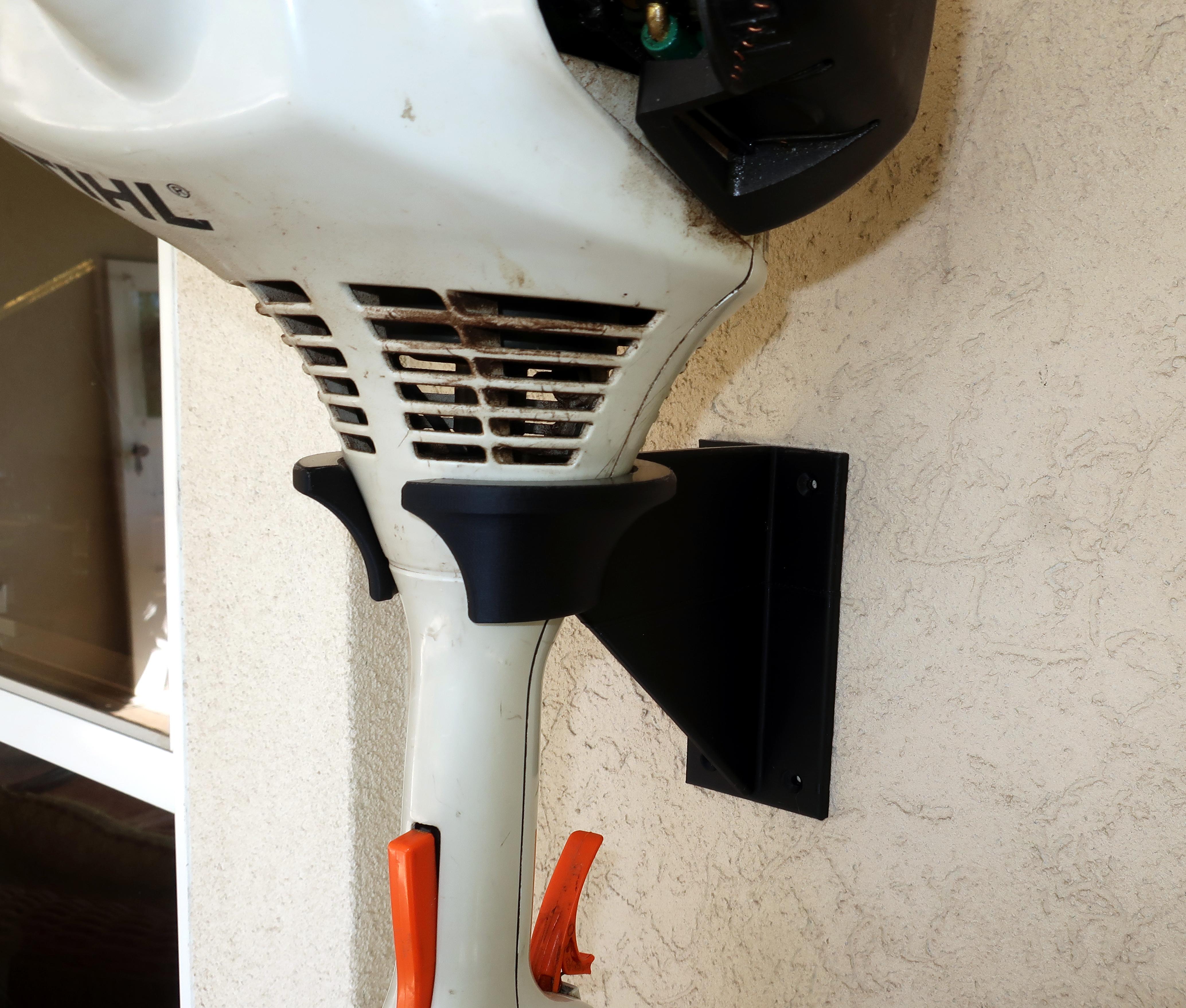 Designed a holder for stihl trimmers. r/3Dprinting