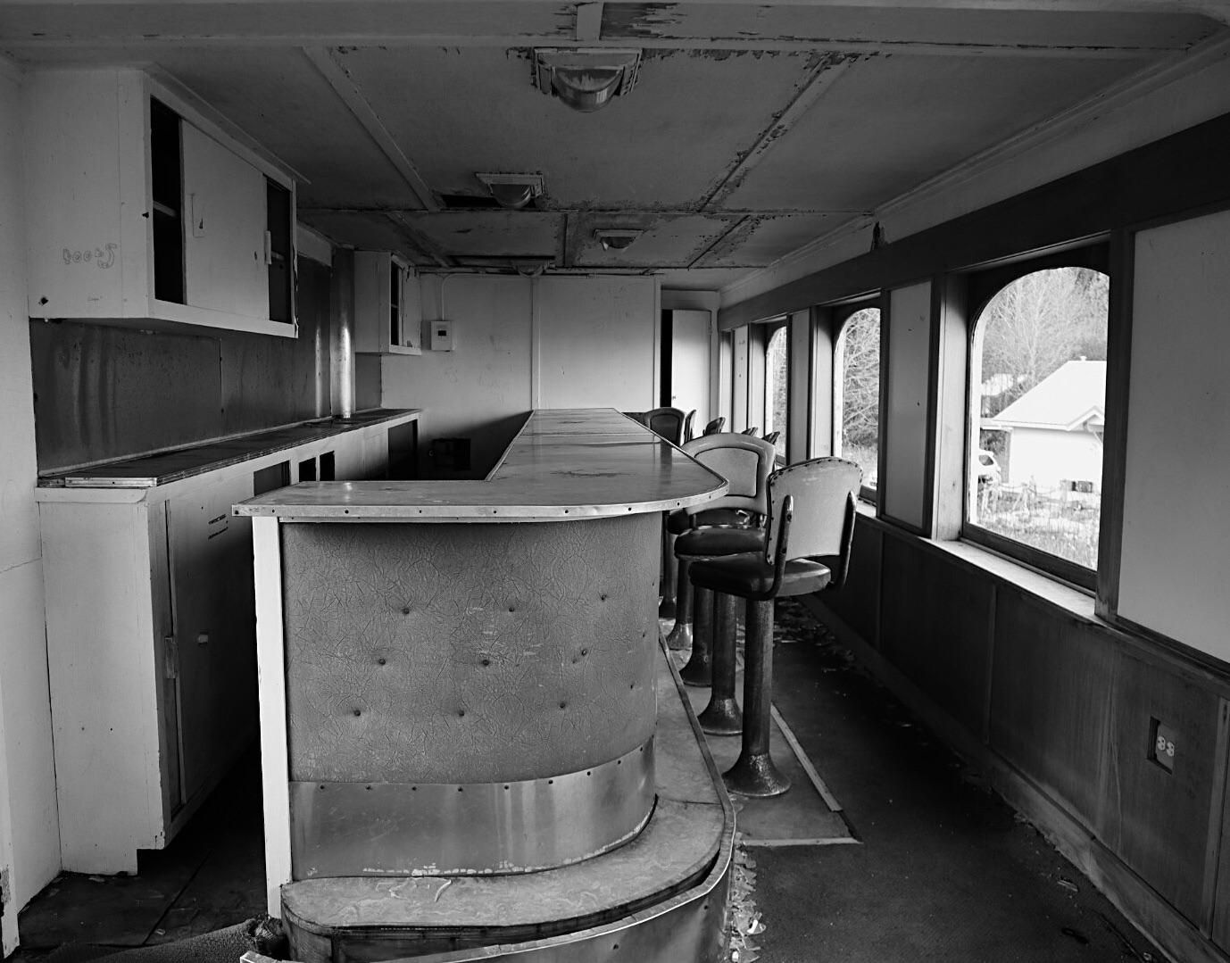 Alaska Railroad bar car beside Resurrection Bay at Seward, AK r