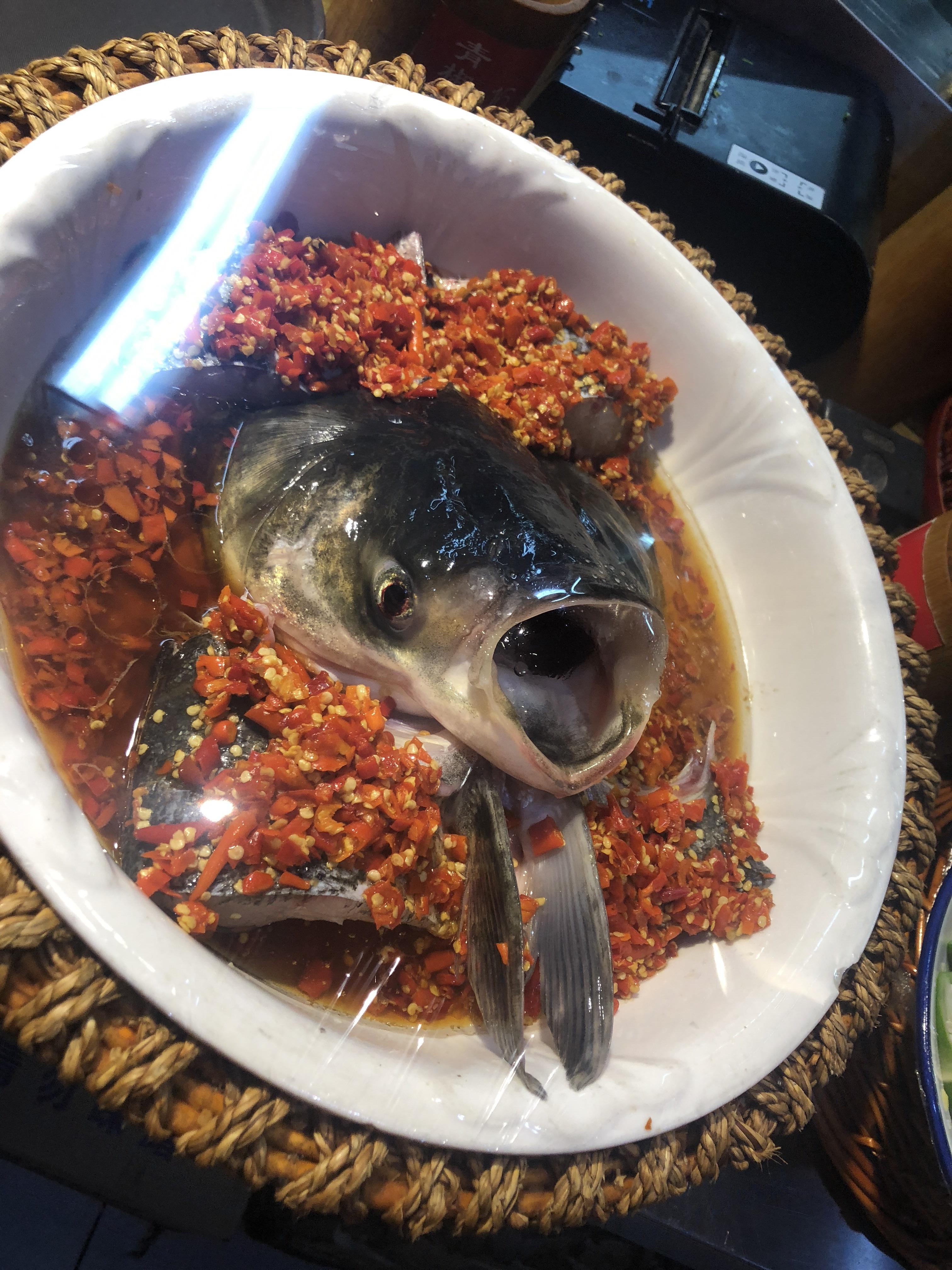 [I ate] steamed fish head with a variety of peppers r/food