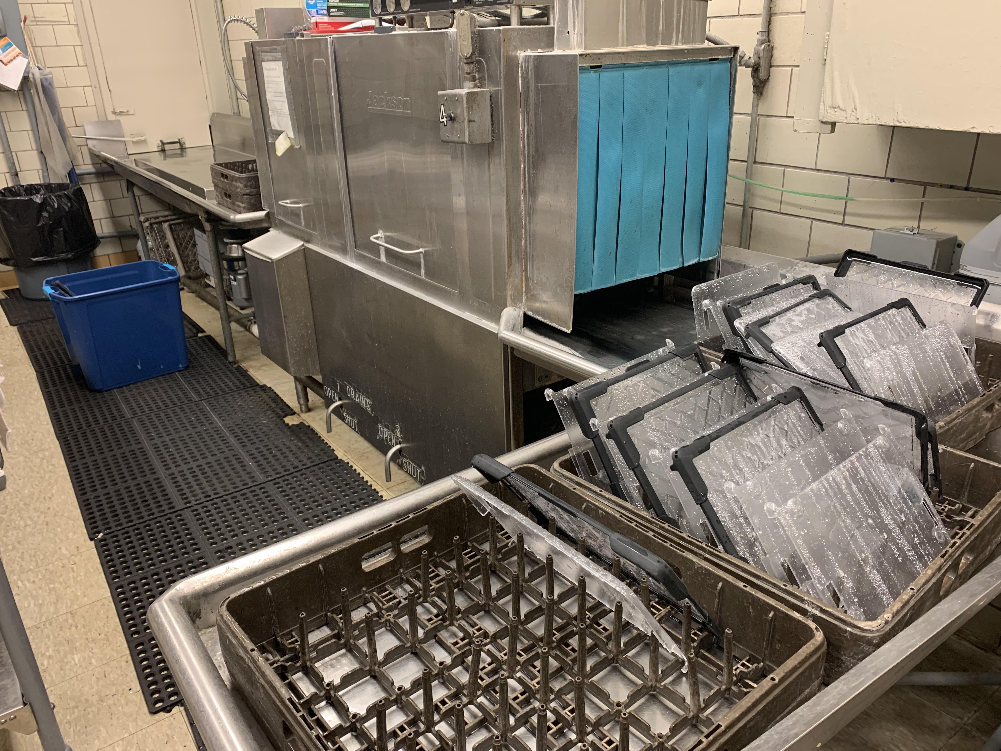 Gross cases go in clean ones come out. I love the cafeteria dishwasher